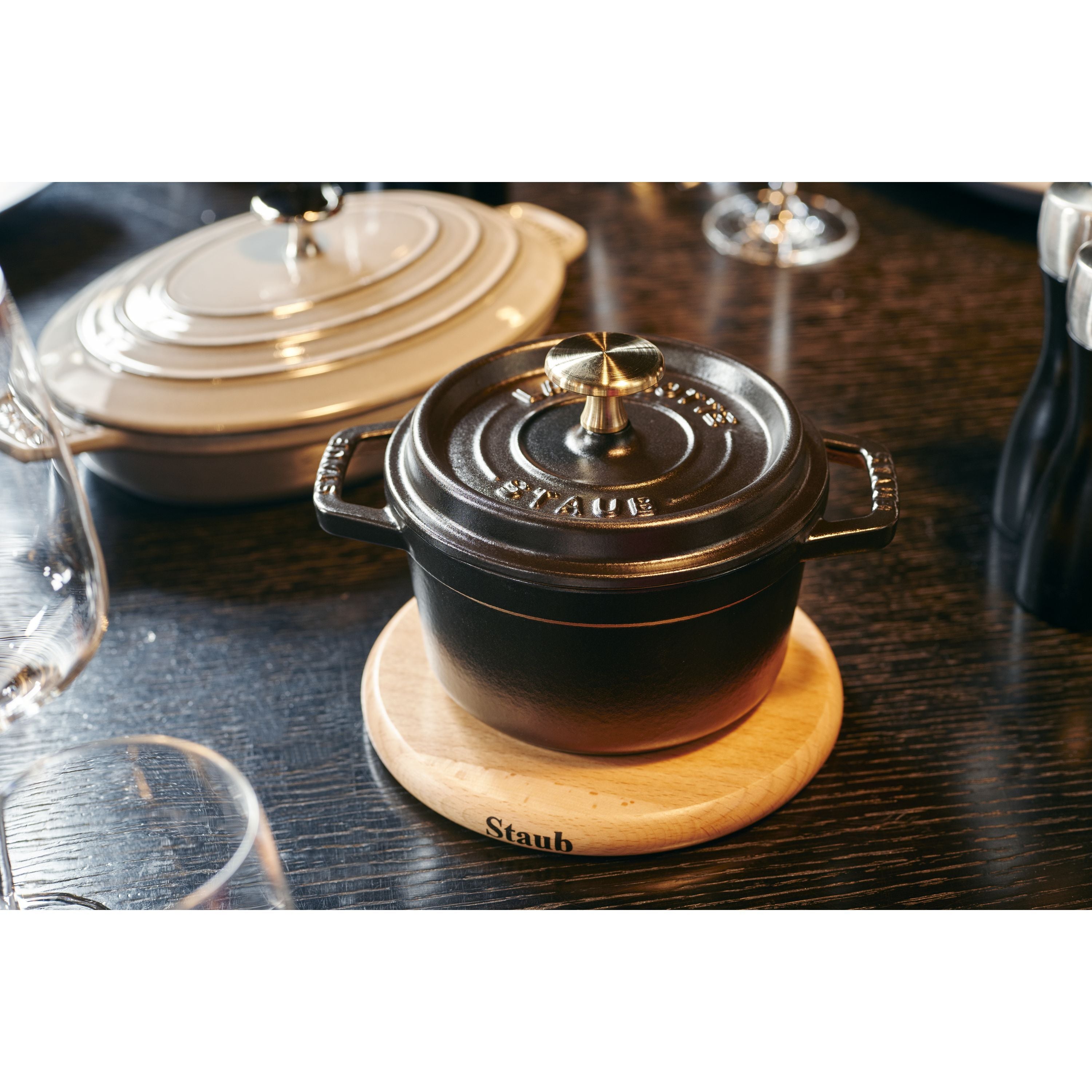 STAUB Specialities Round Beech Trivet Magnetic holds Staub Cocotte on table