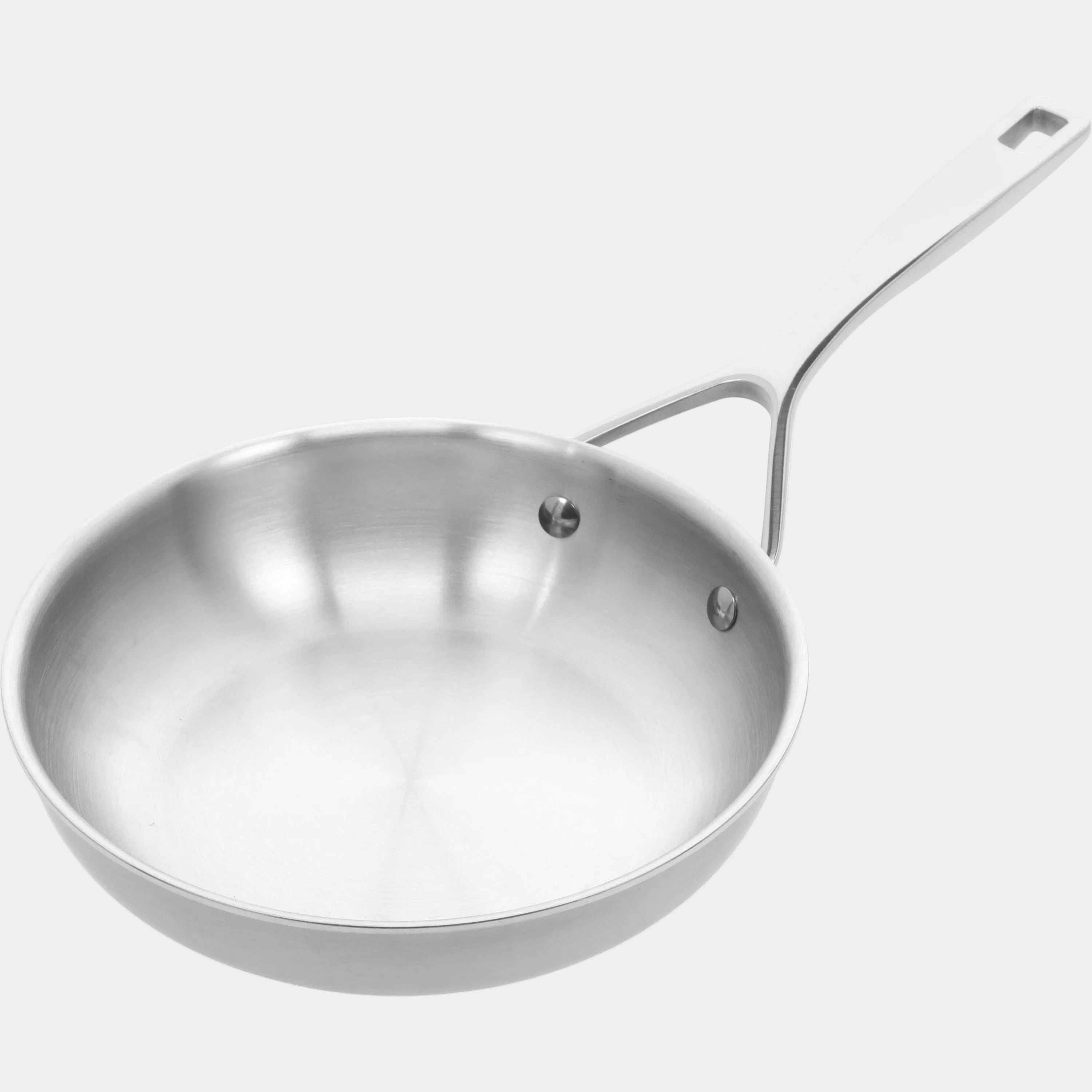 Stainless steel frying pan on a white background