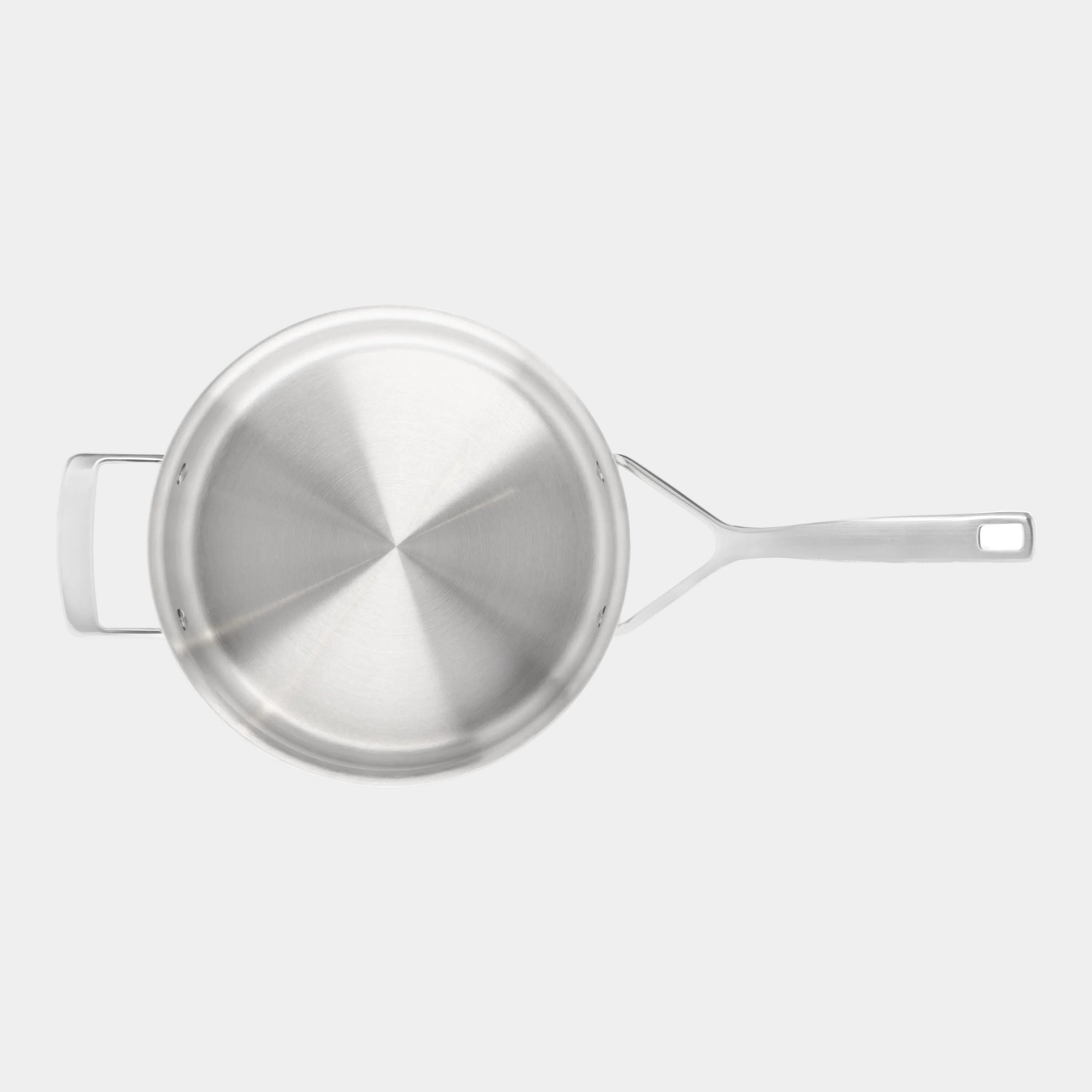 Stainless steel pot with lid on a white background