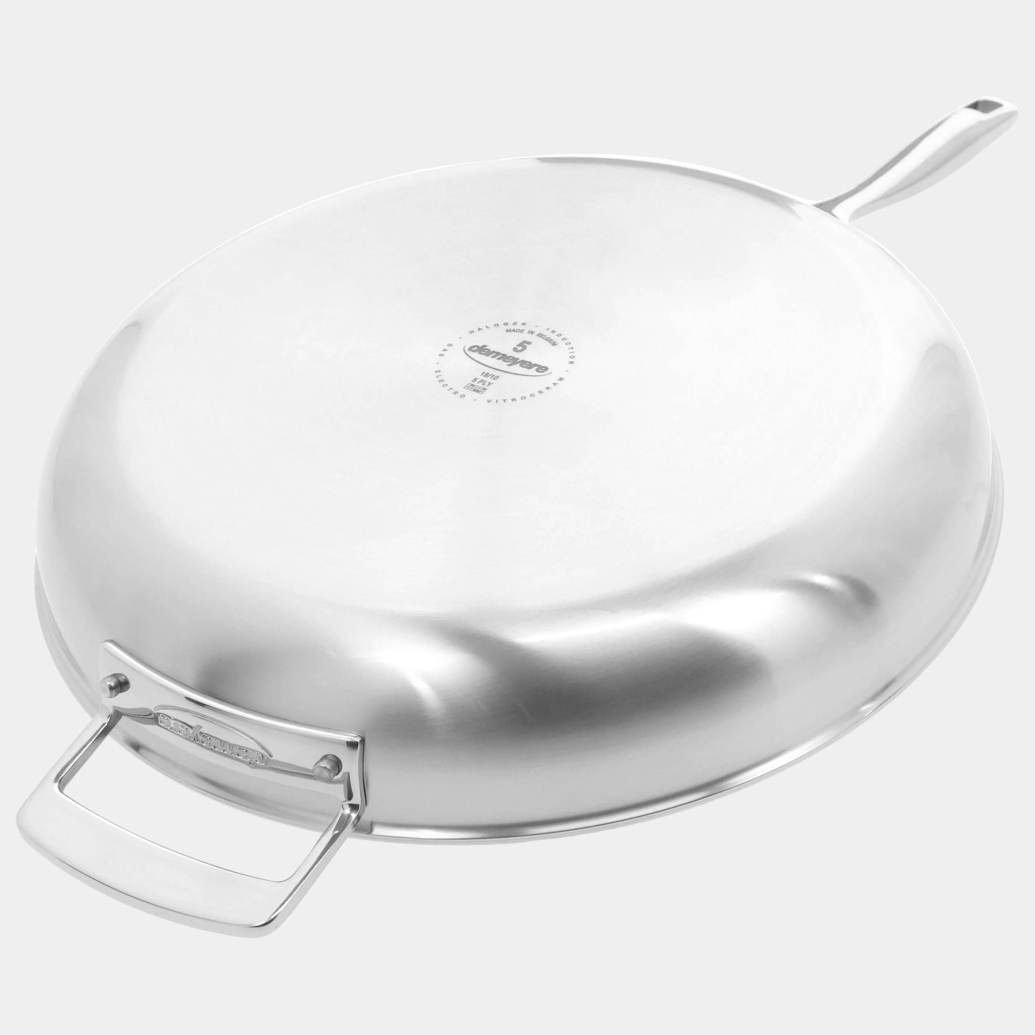 Stainless steel frying pan with lid on a white background