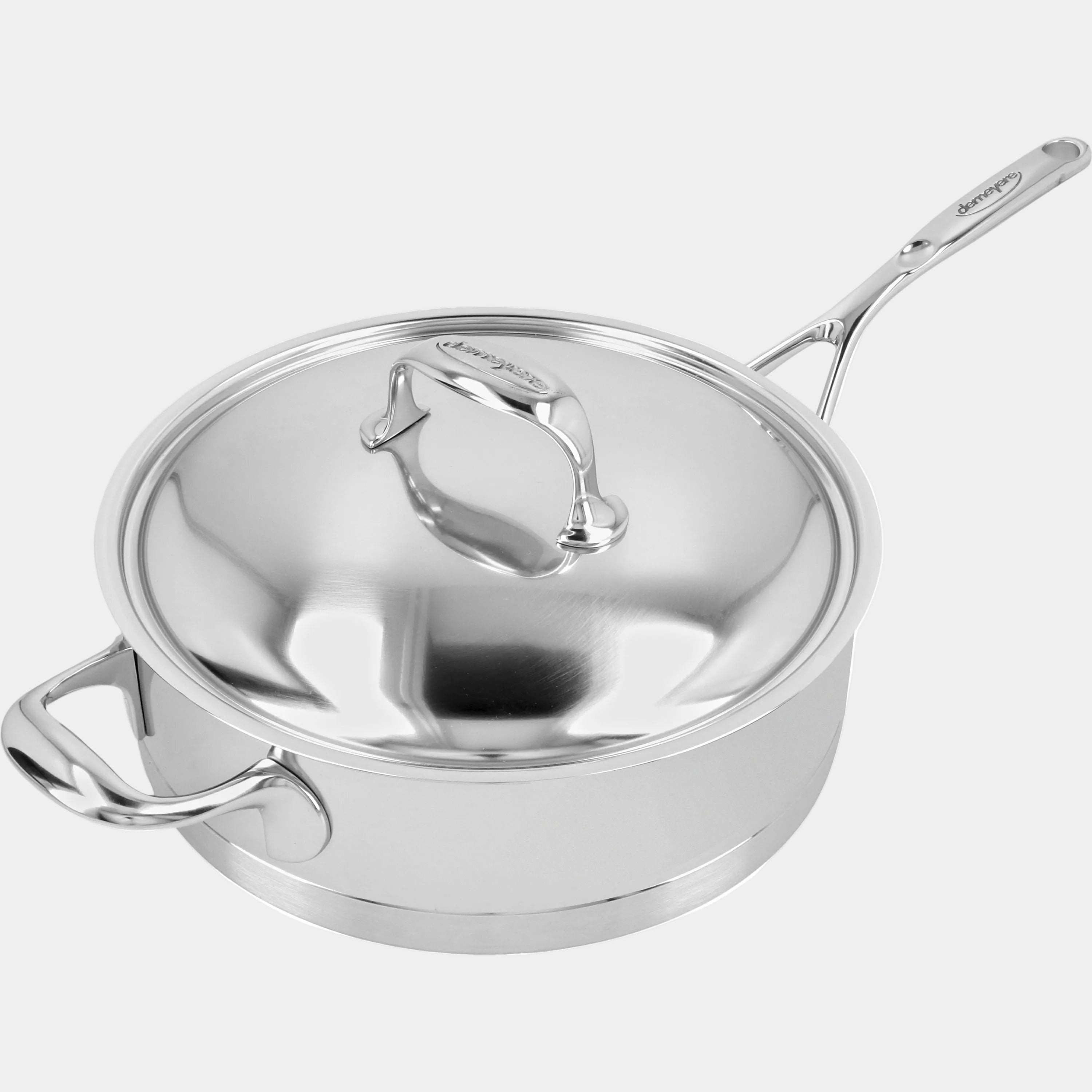 Stainless steel pot with lid on a white background