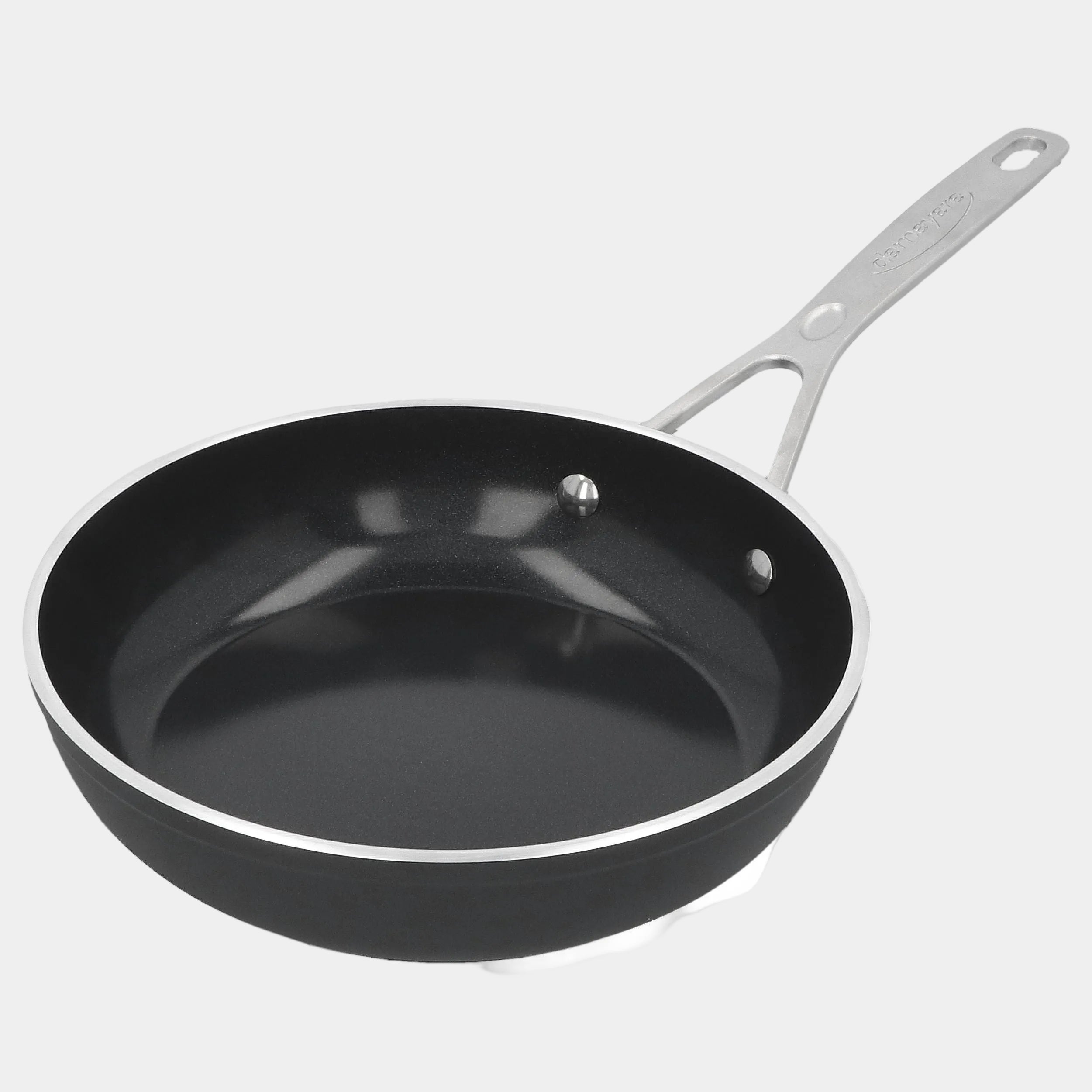 Black frying pan with a gray handle on a white background