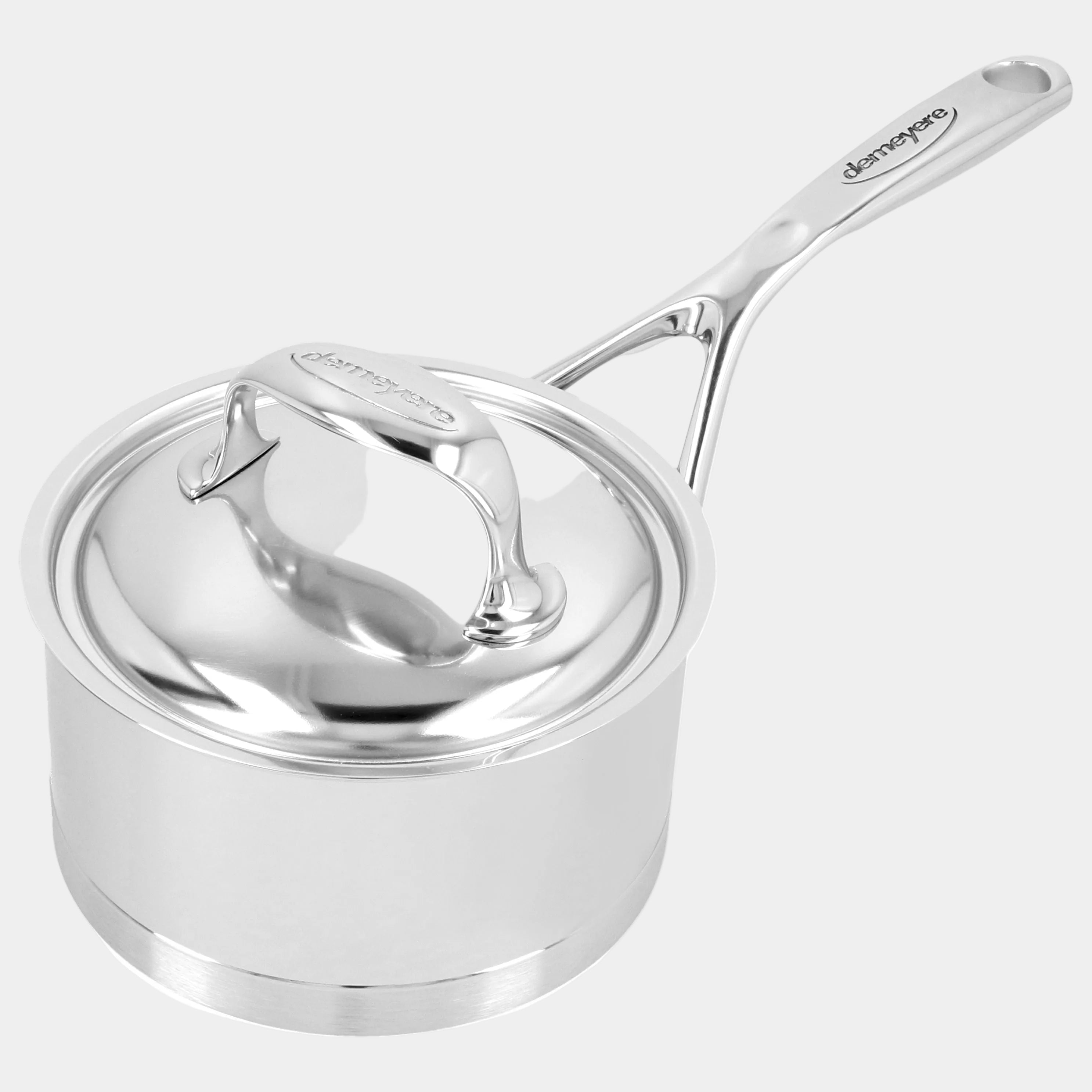 Silver saucepan with lid on a white background