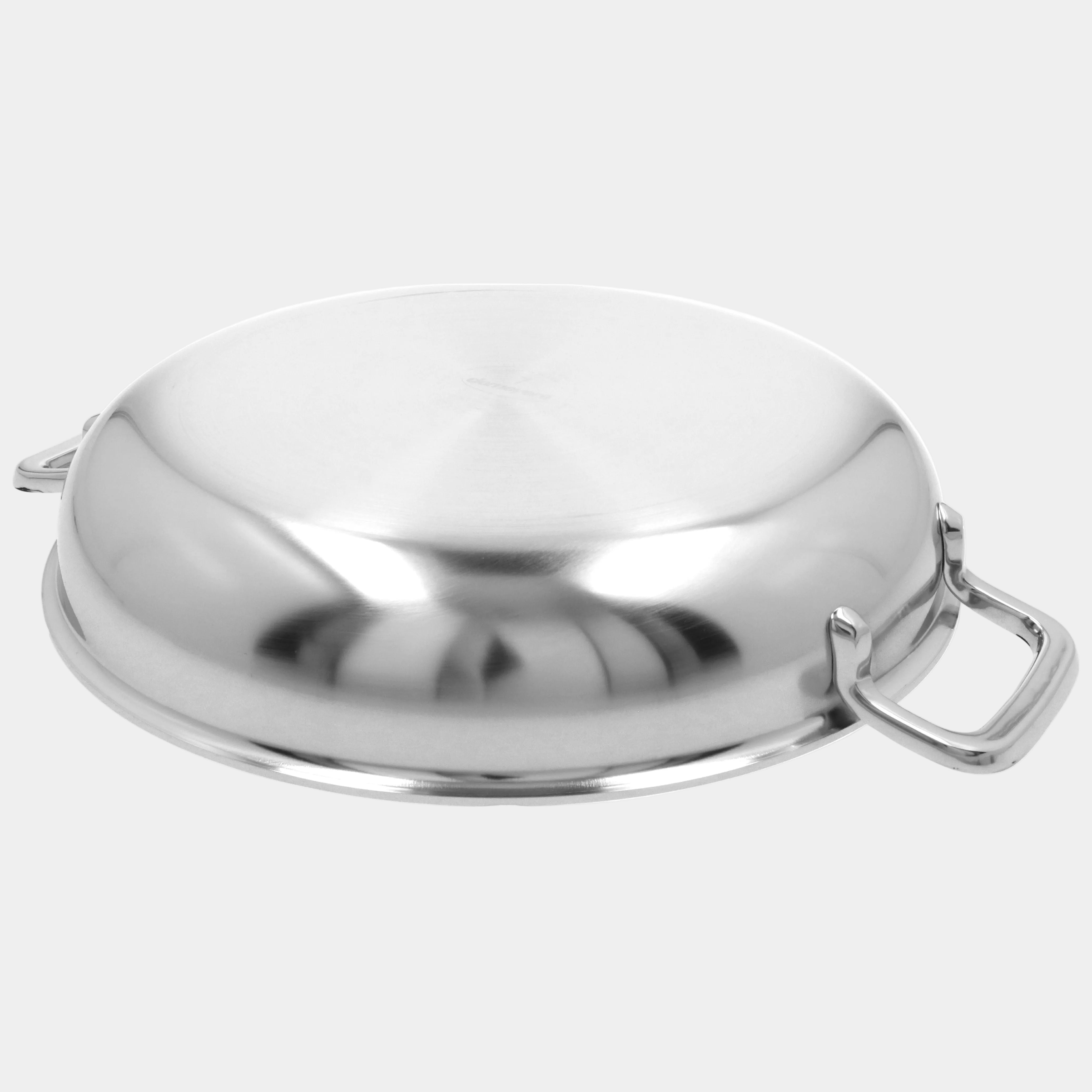 Stainless steel pot lid with handle on a white background