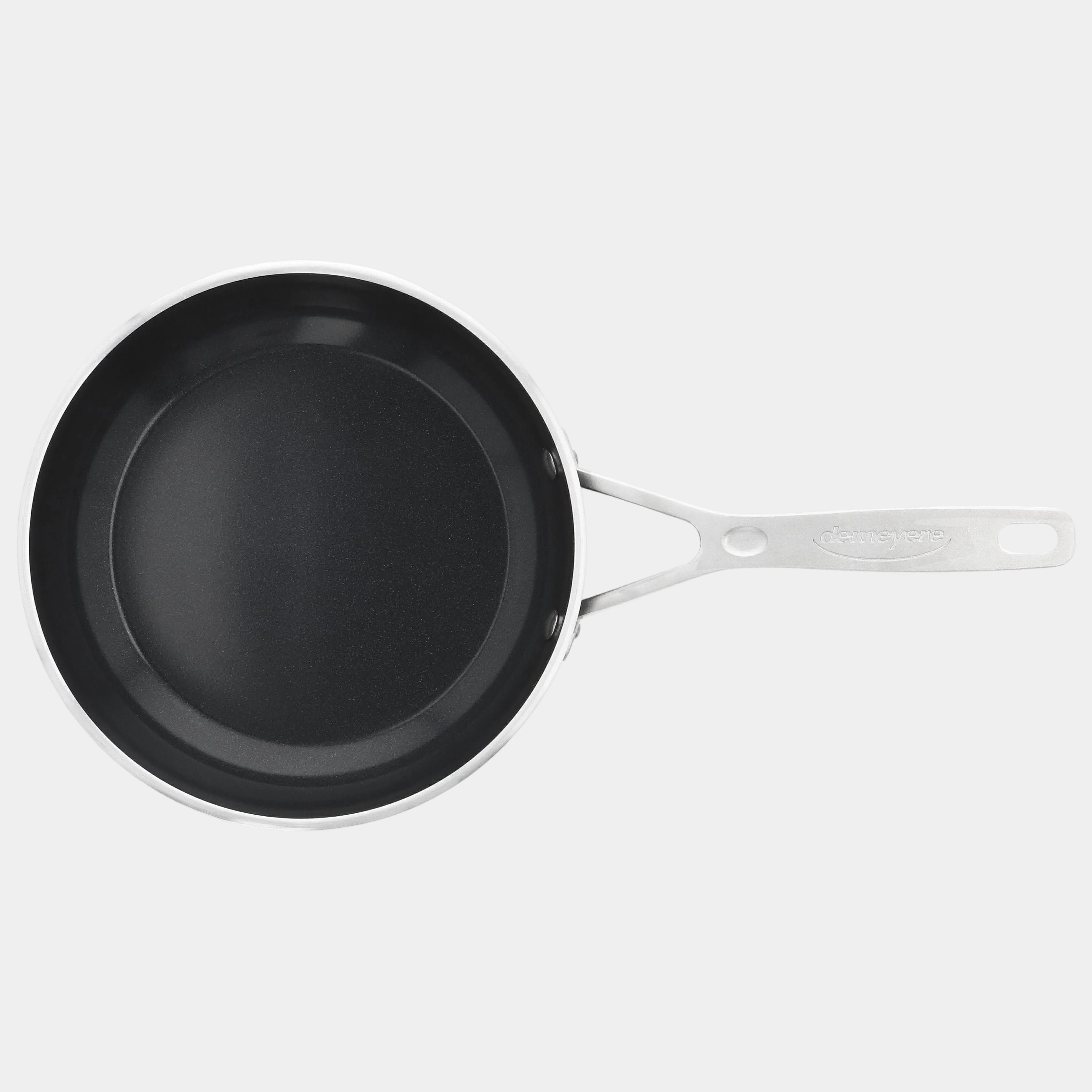 Black frying pan with a silver handle on a white background