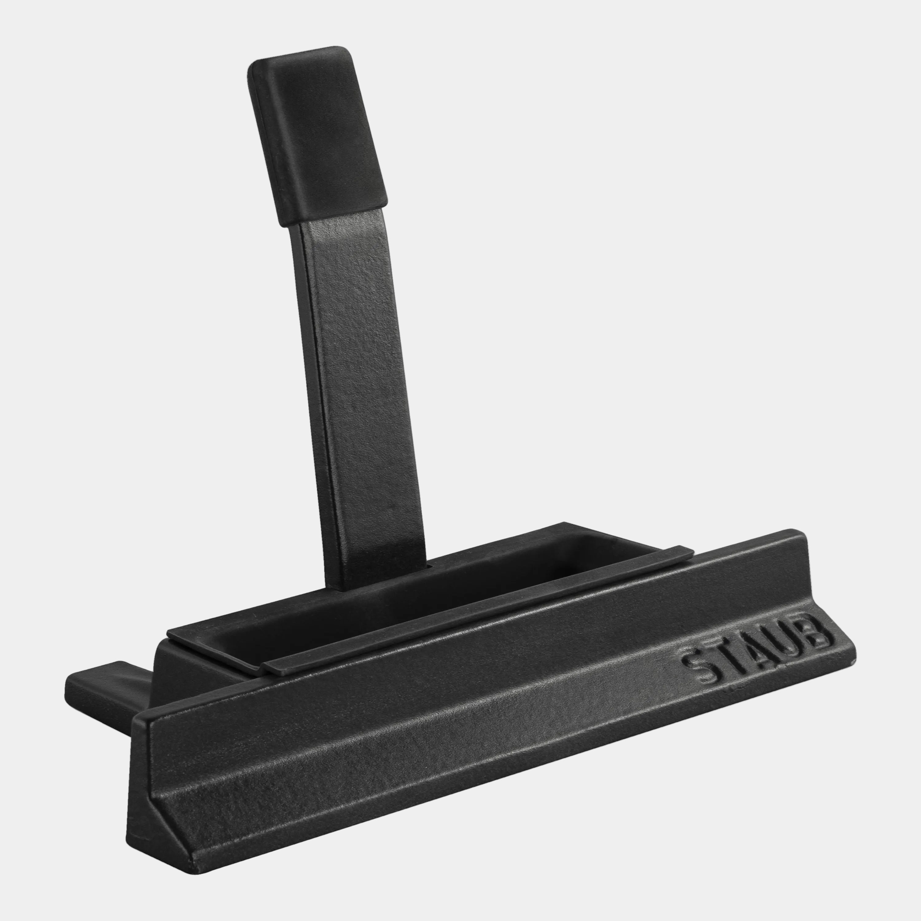 STAUB Cast Iron Lid Holder in black, designed to collect droplets and protect surfaces from scratches, heat-resistant and dishwasher safe.