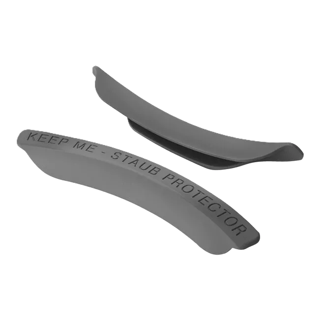 Gray stovetop protector with 'KEEP ME - STAUB PROTECTOR' text on a white background