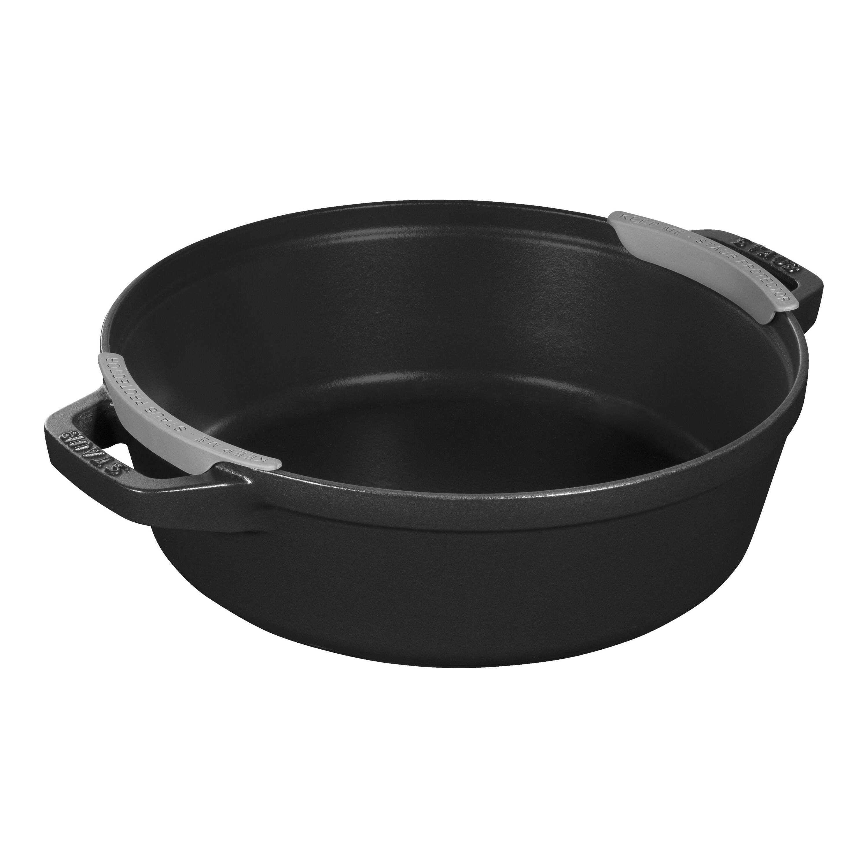 Black cast iron pot with handles on a white background