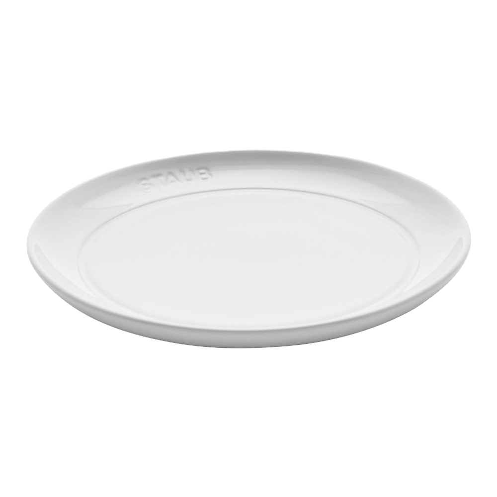 White ceramic plate on a white background