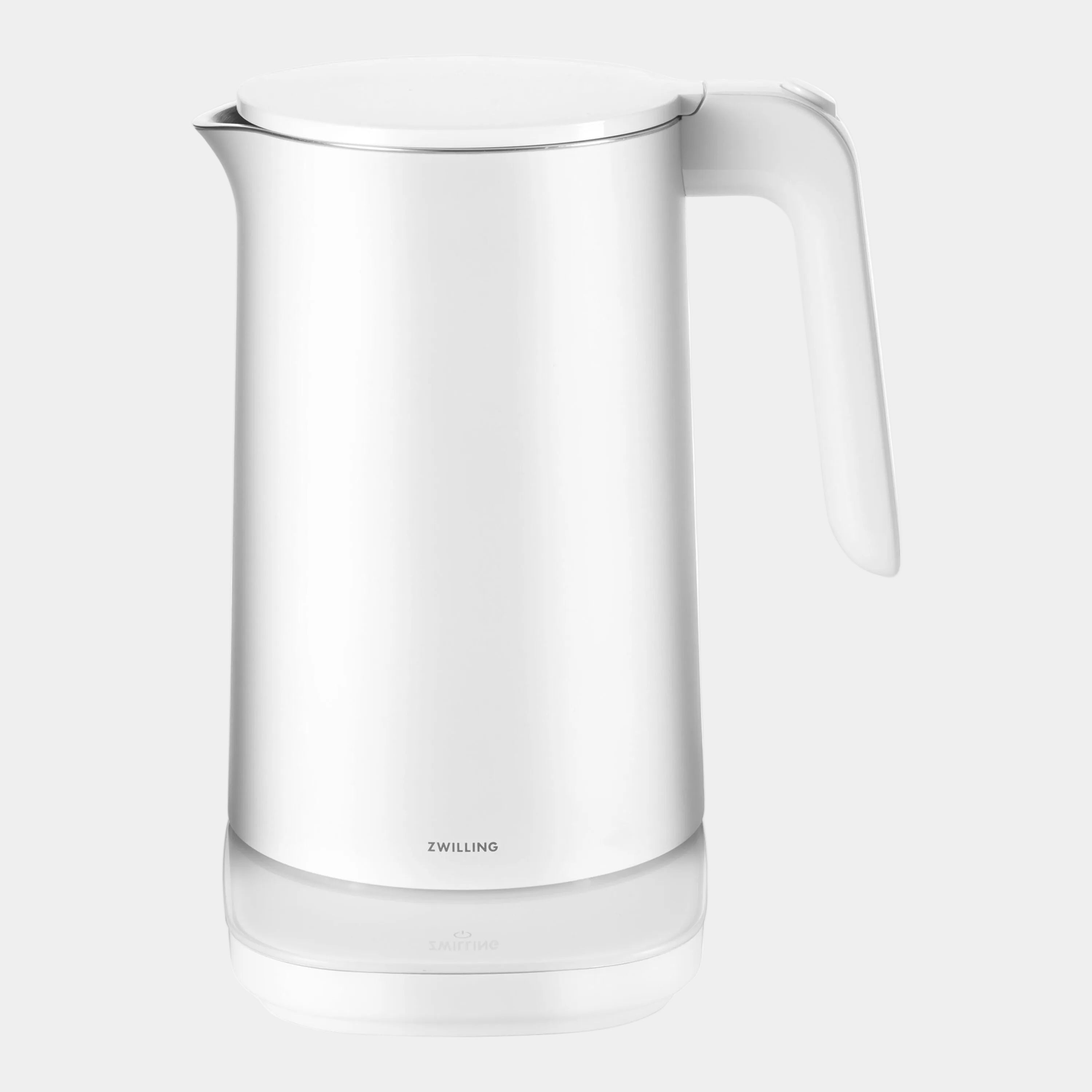 White electric kettle with handle on a white background