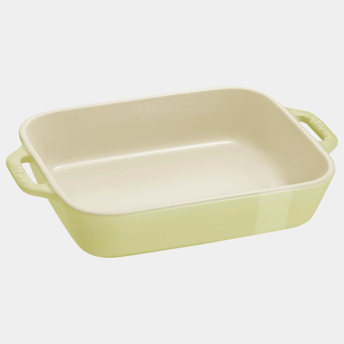 Rectangular ceramic baking dish with handles on a white background