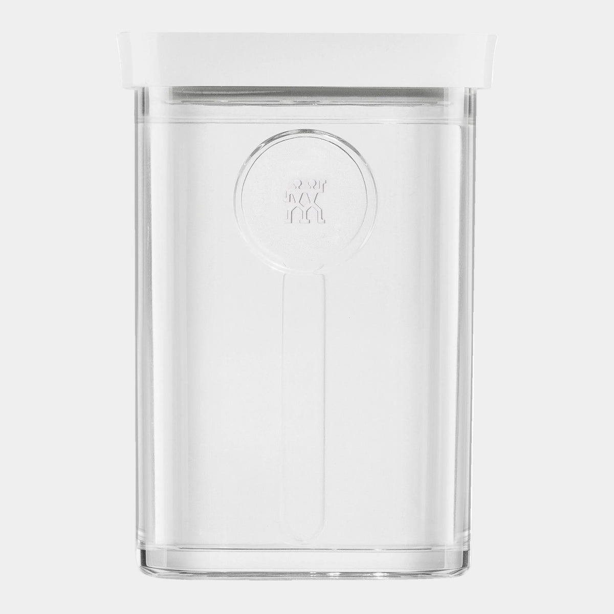 Clear glass storage jar with white lid on a white background