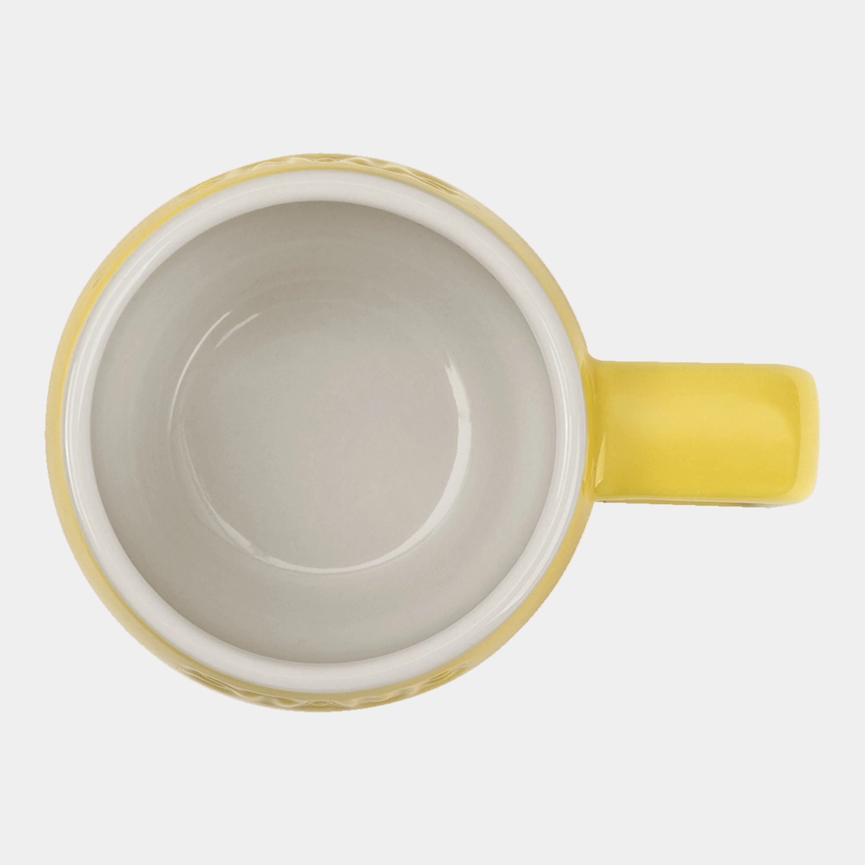 Yellow mug with a white interior on a white background