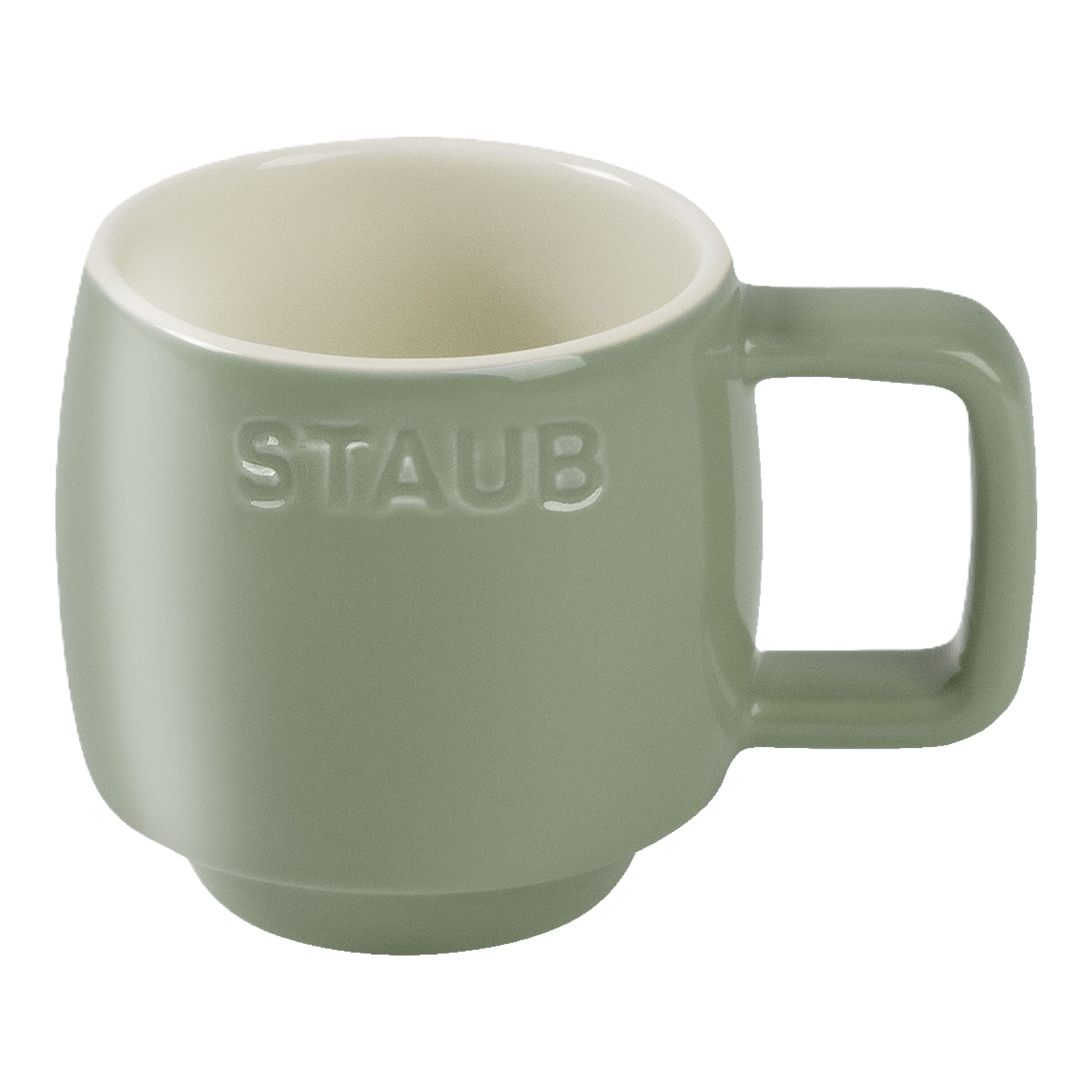 Green mug with 'Staub' branding on a white background
