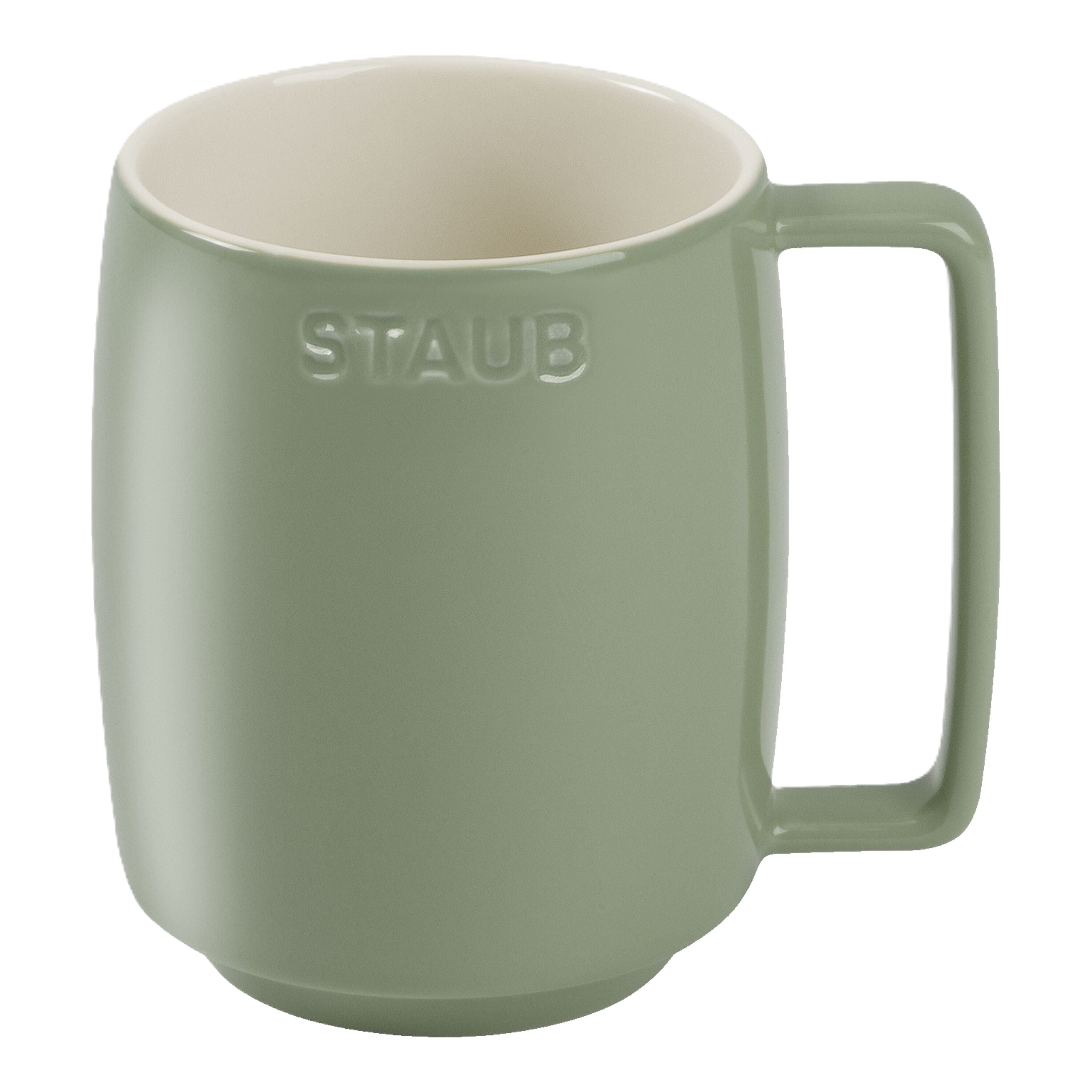 Green mug with 'Staub' branding on a white background