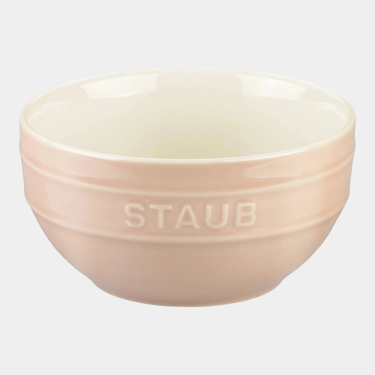 Pink Staub bowl on a white background