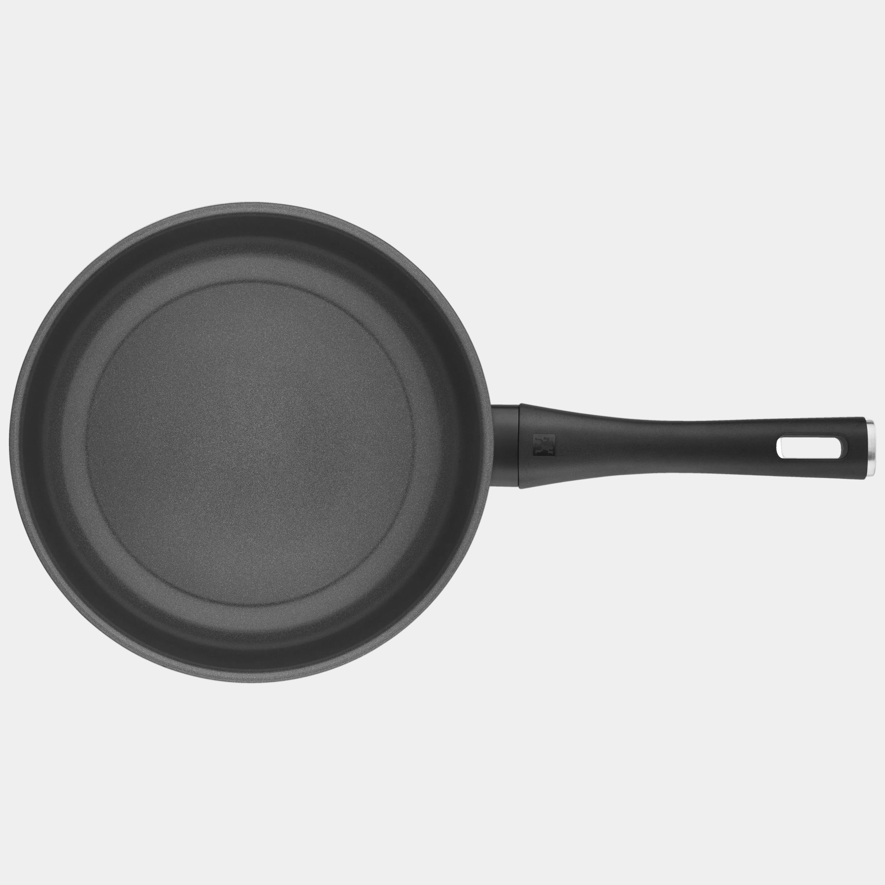 Black frying pan on a white background