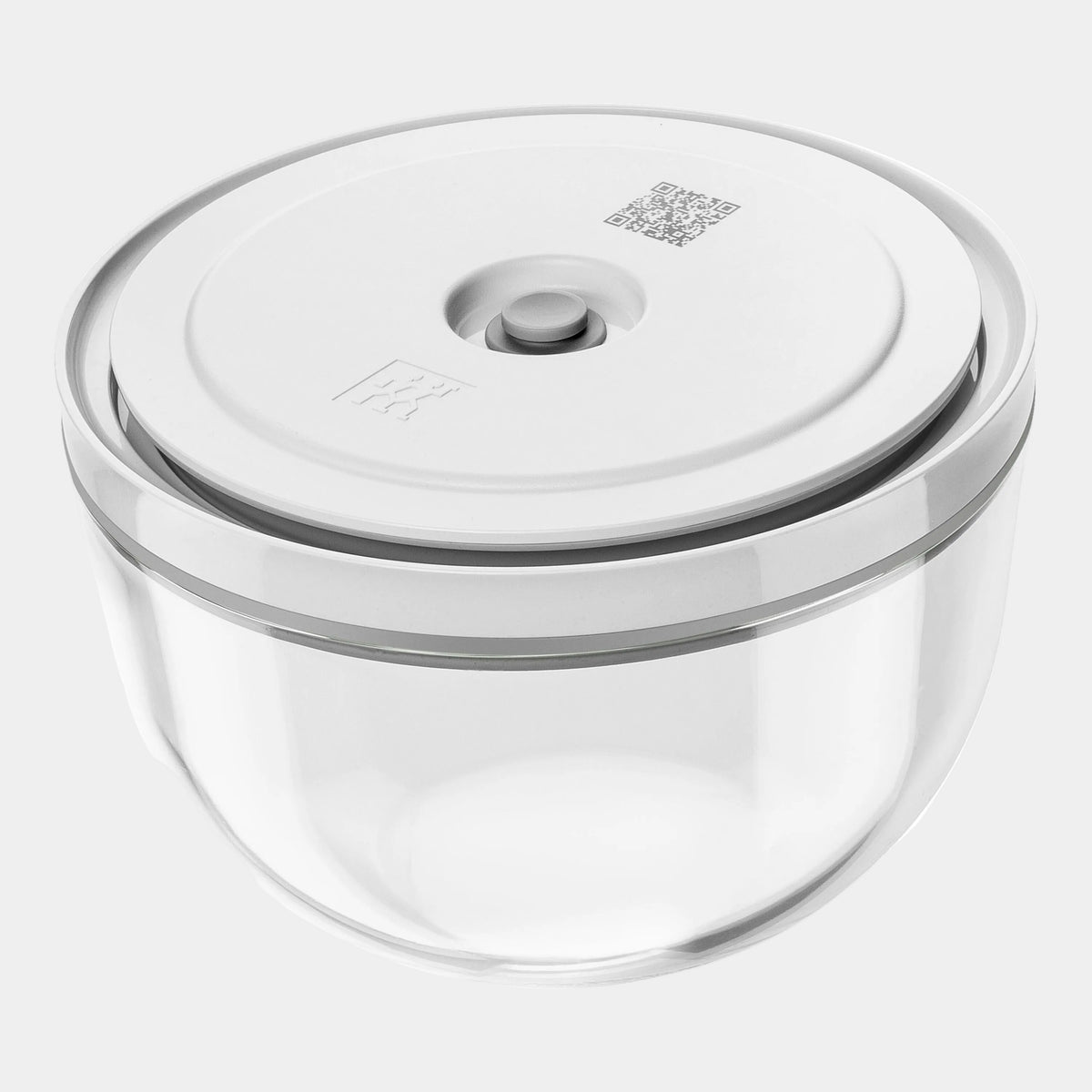 Clear glass container with a white lid on a white background