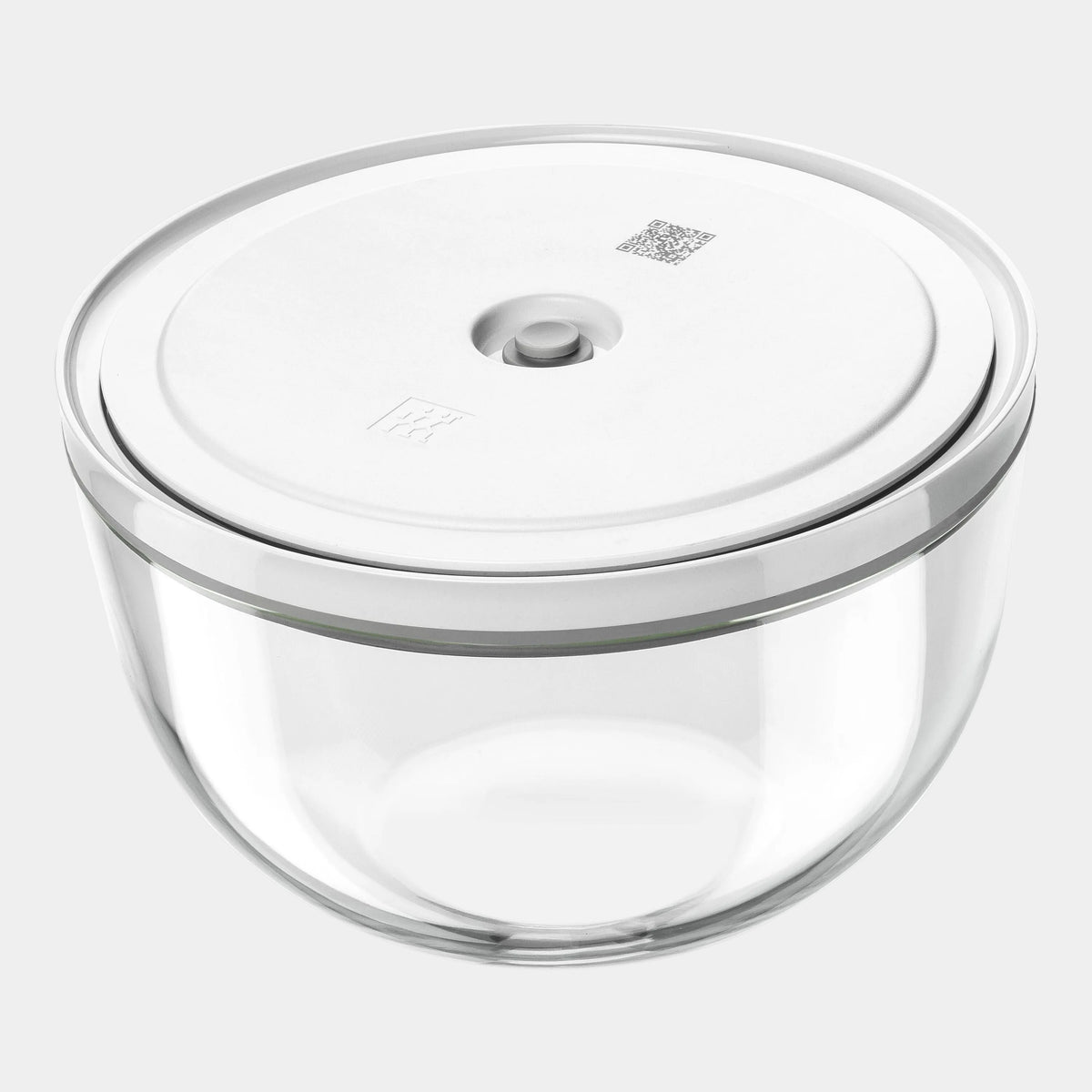 Clear glass container with a white lid on a white background