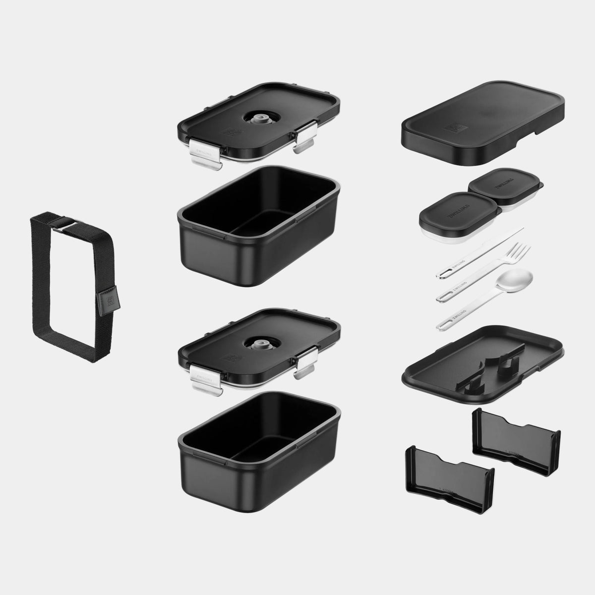 Black plastic containers and accessories on a white background