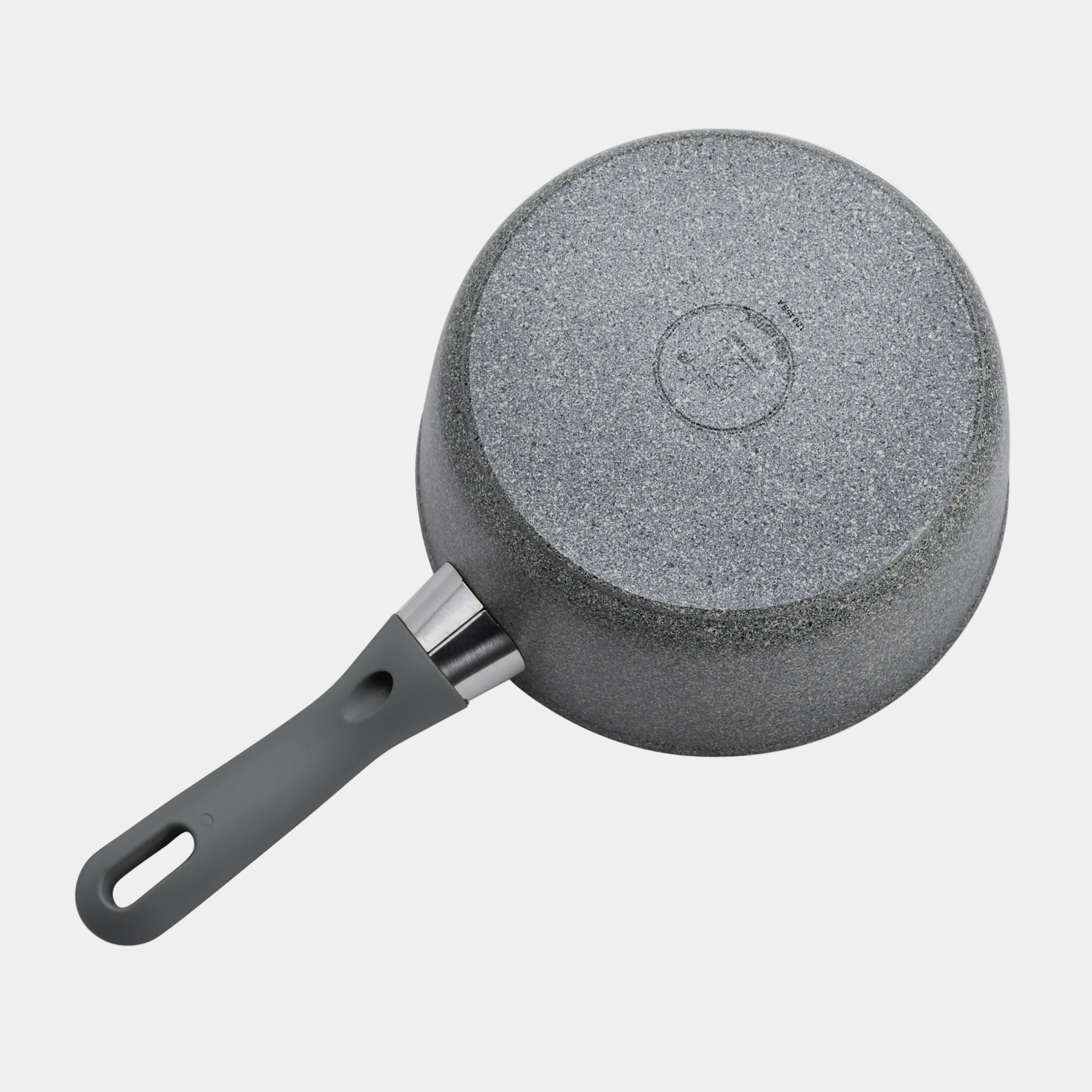 Gray frying pan with textured surface on a white background