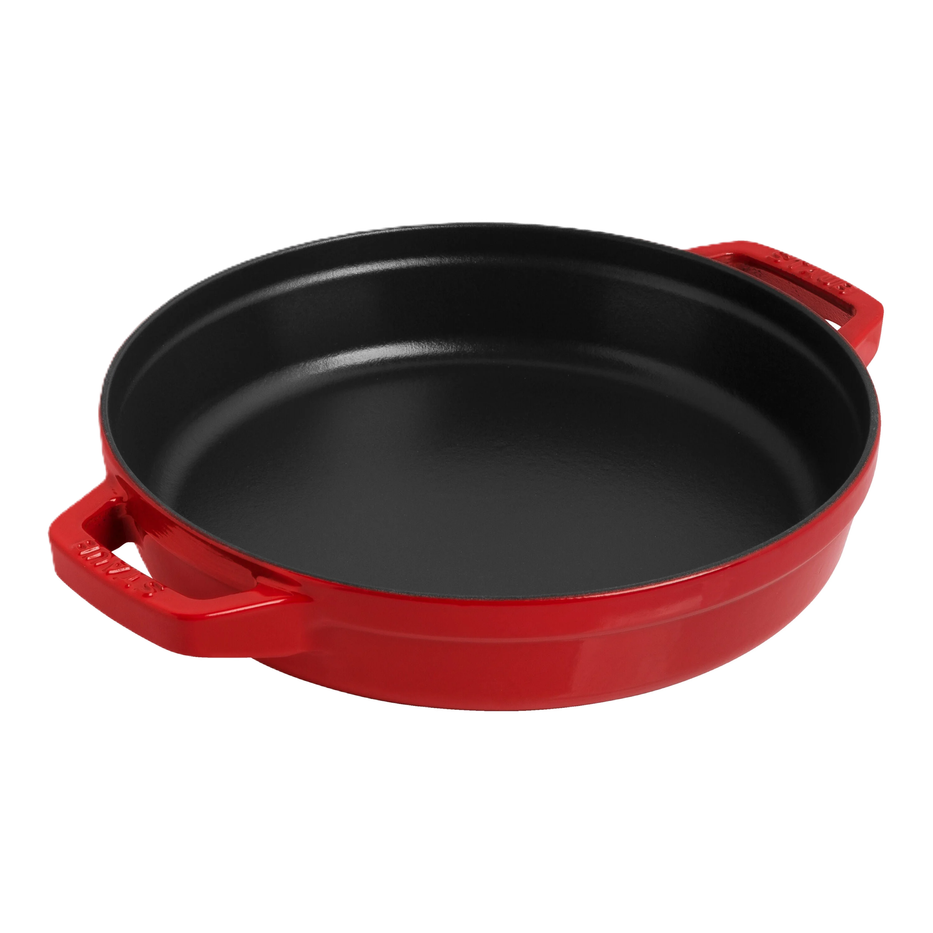 Red cast iron skillet on a white background