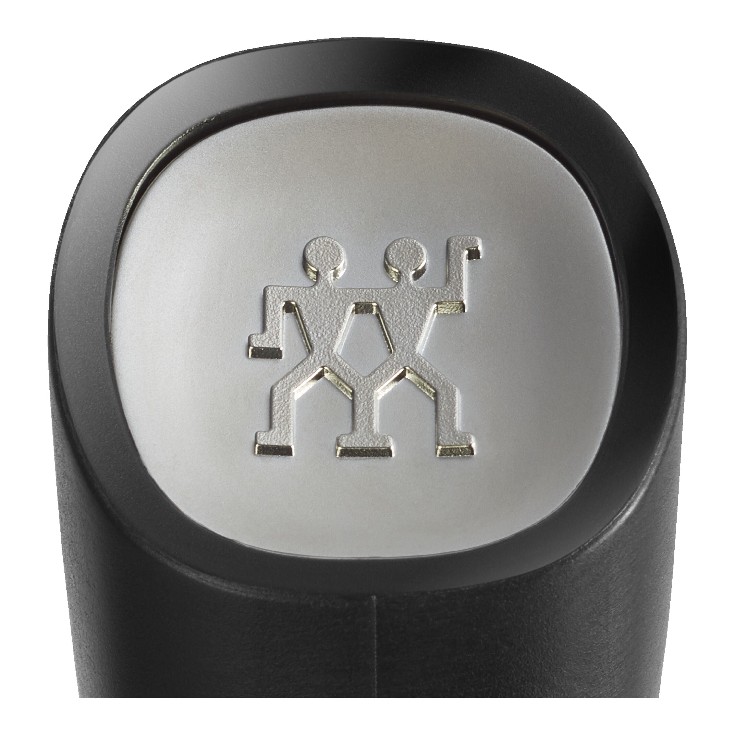 Close-up of a black and silver object with a logo on a white background