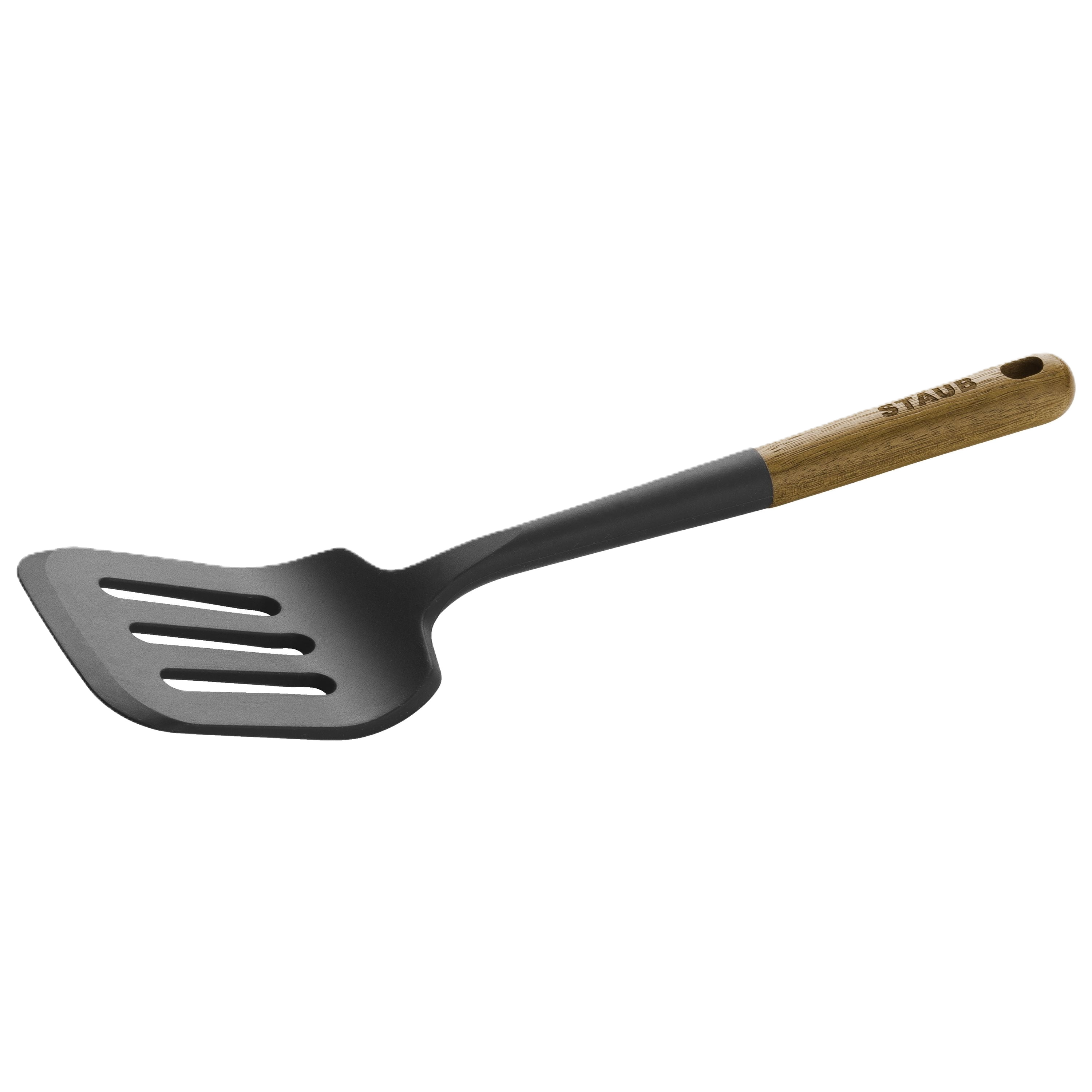 Black slotted spatula with wooden handle on a white background