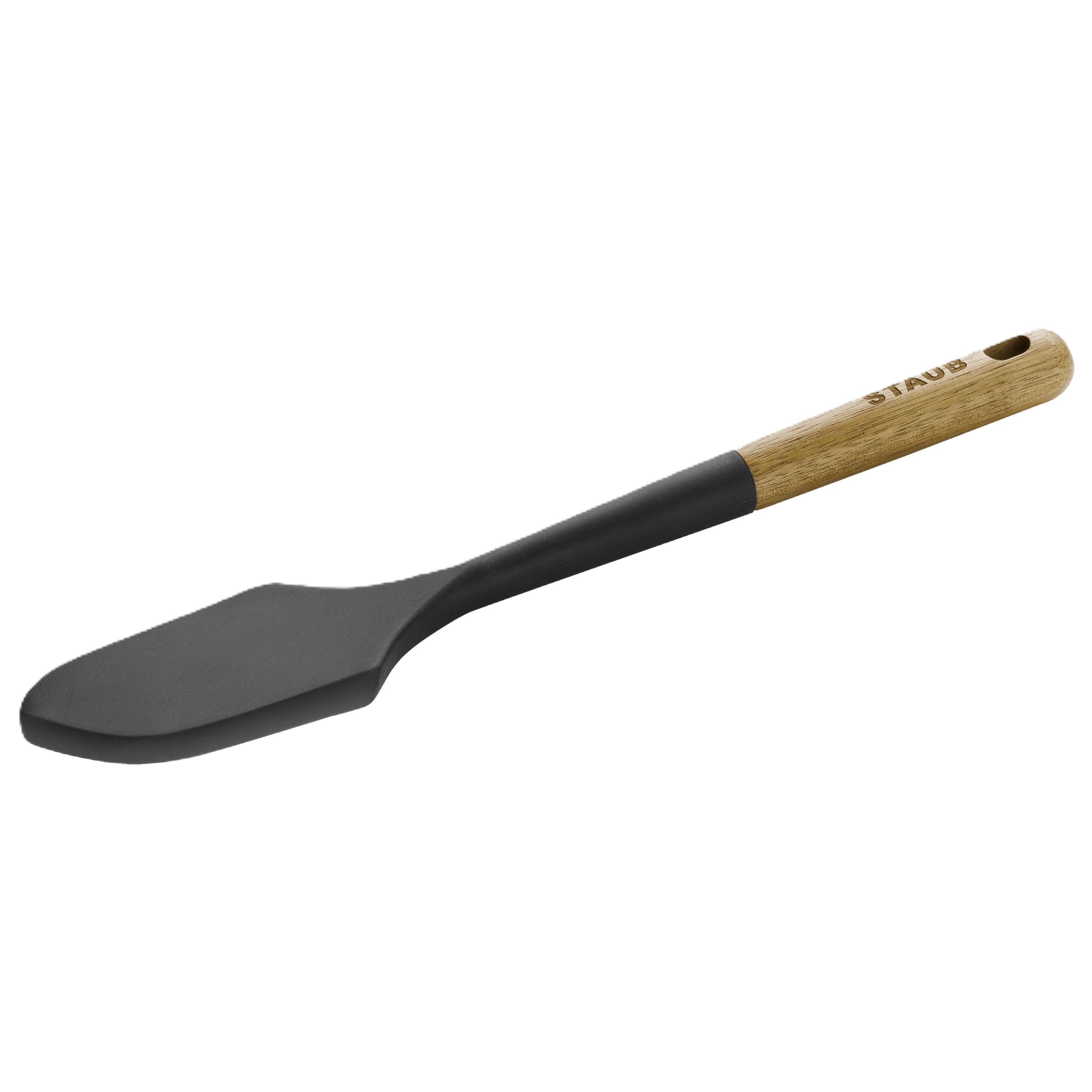 Black spatula with wooden handle on a white background