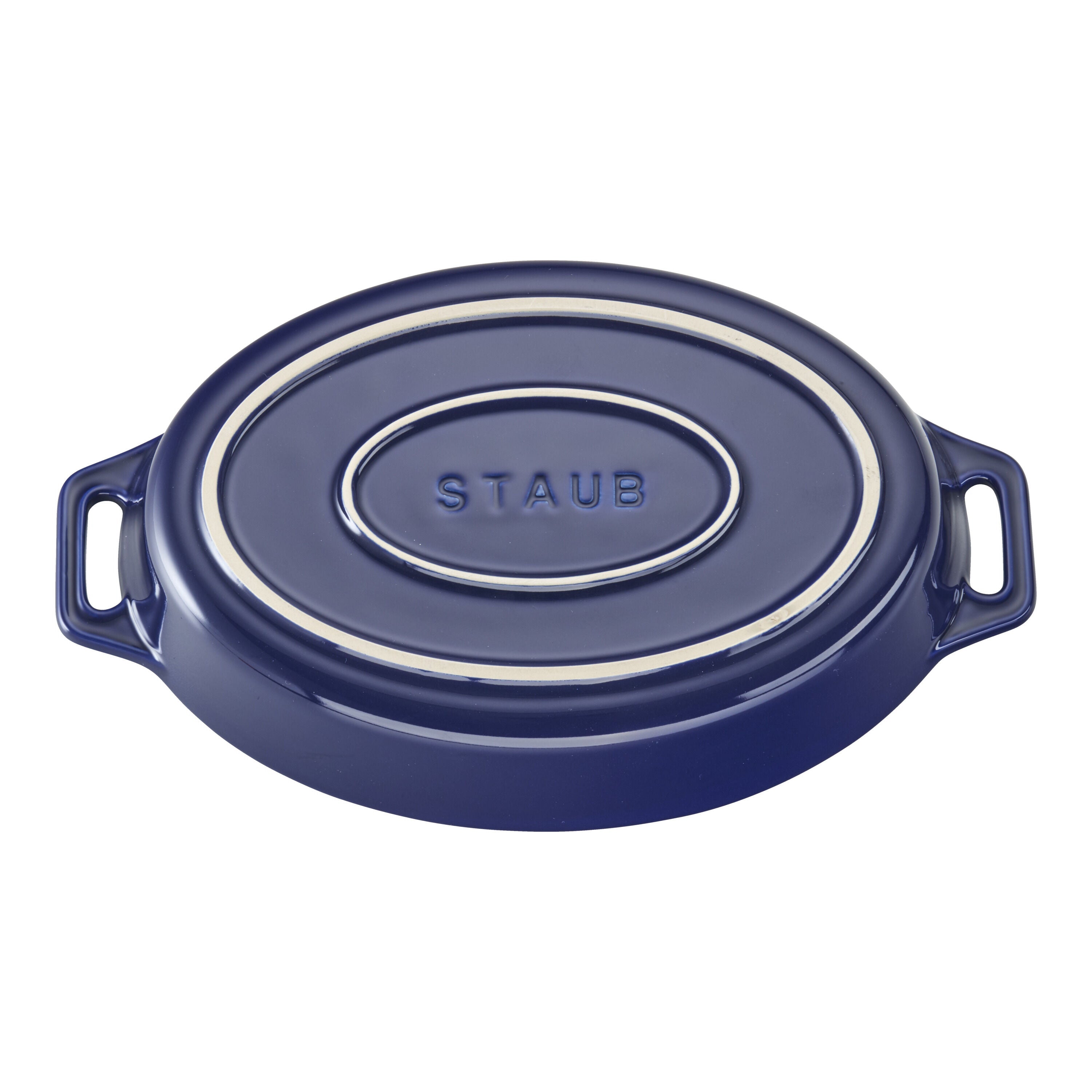 Blue Staub oval dish on a white background