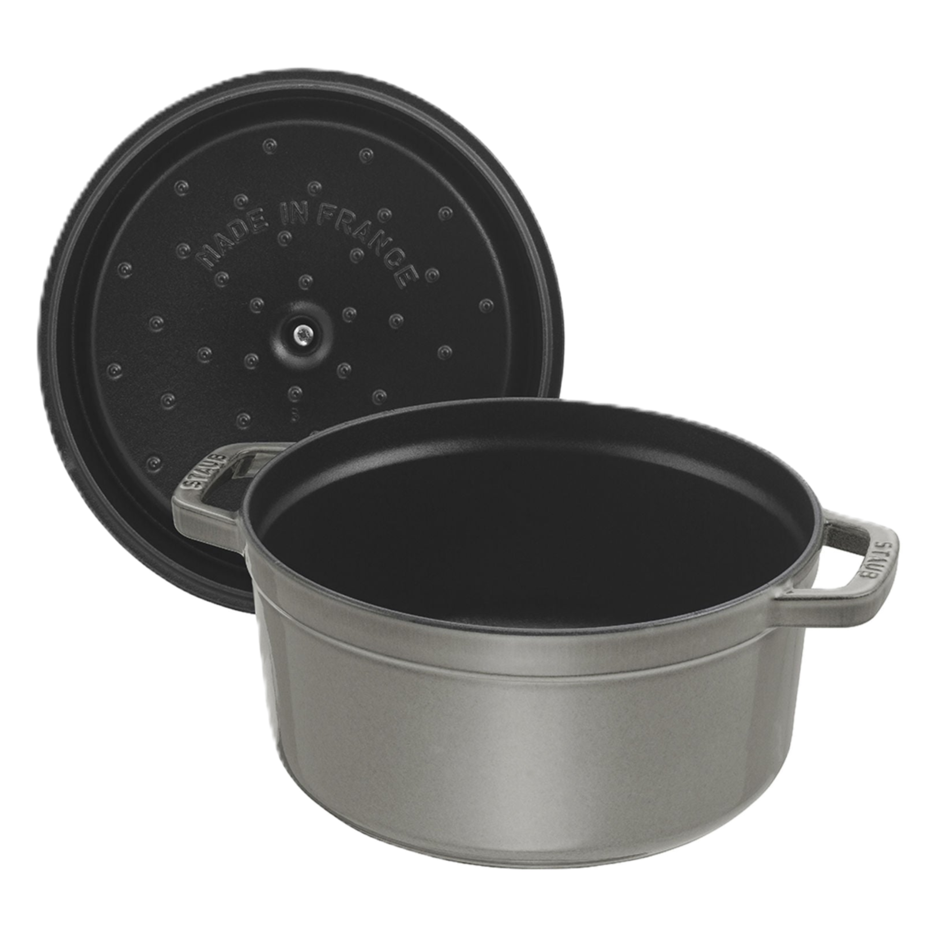 Black cast iron pot with lid on a white background