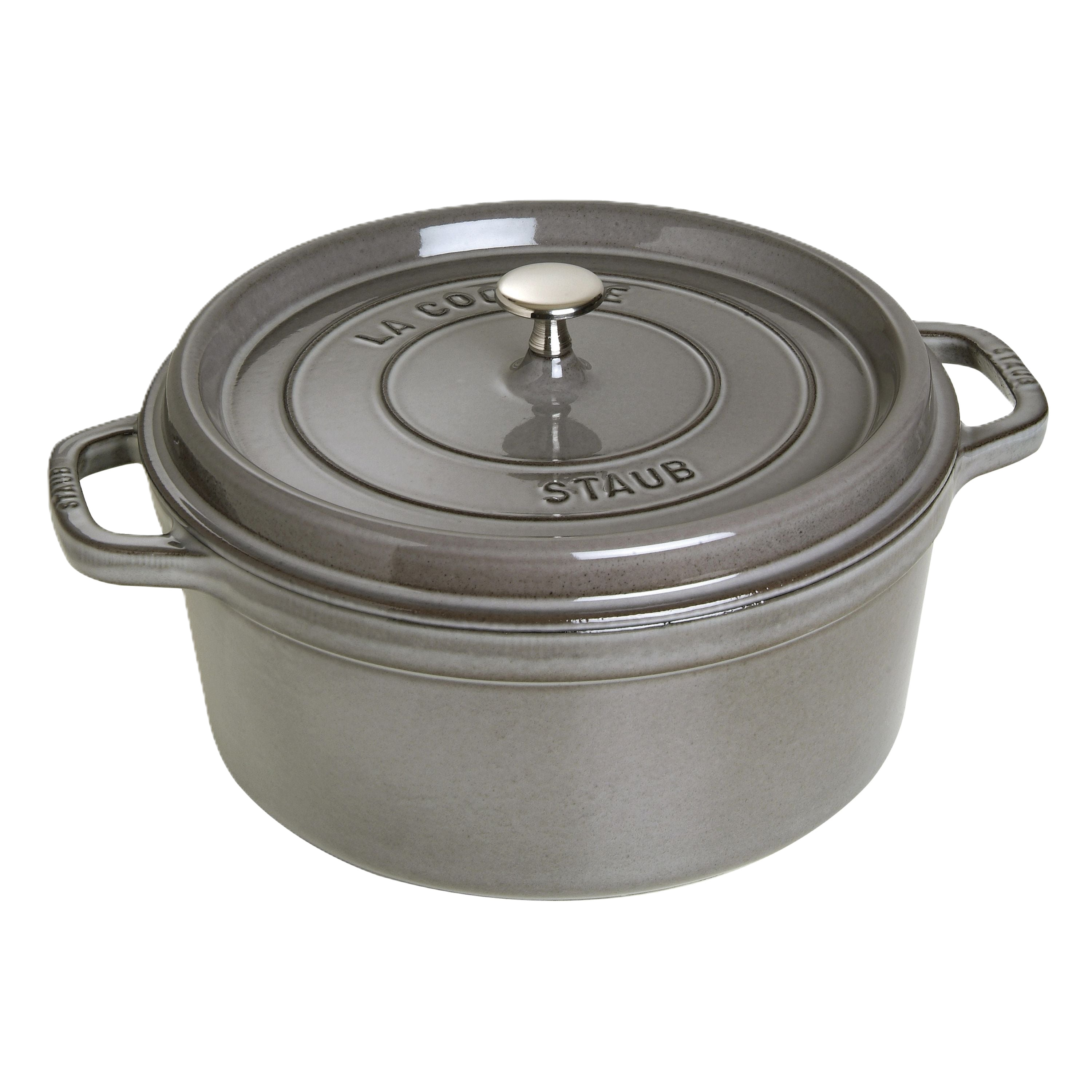 Staub cooking pot with lid on a white background