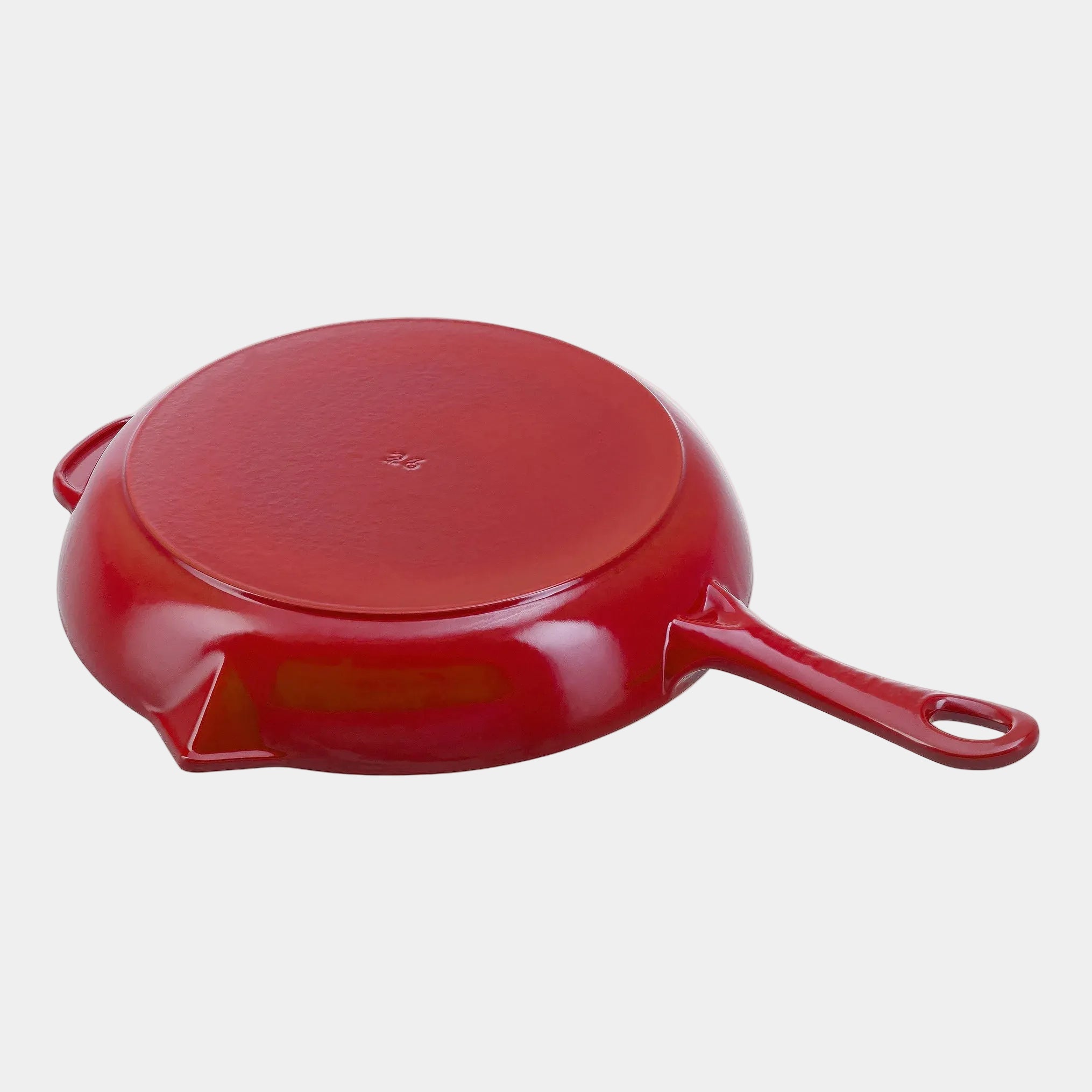 Red frying pan on a white background