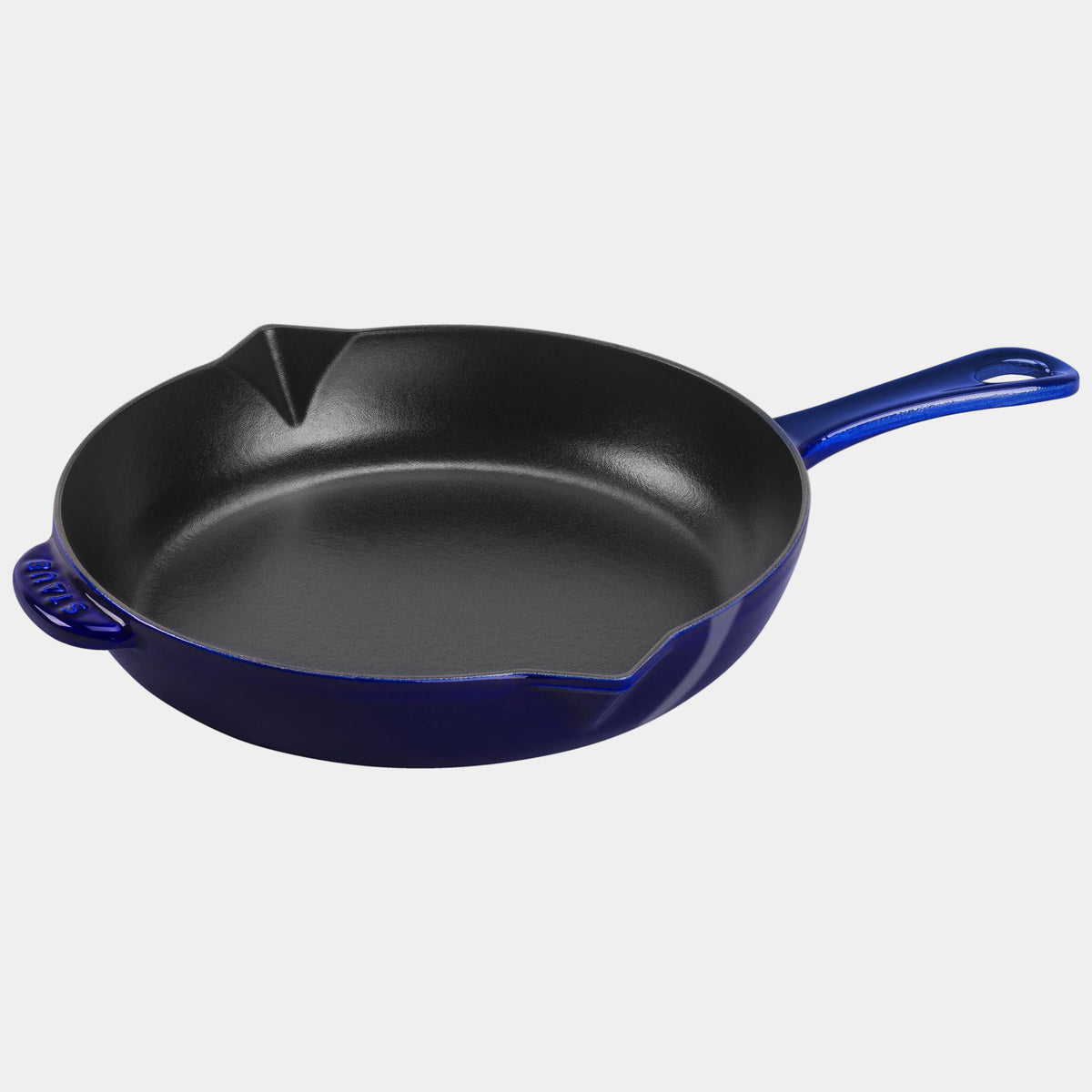 Blue cast iron skillet on a white background