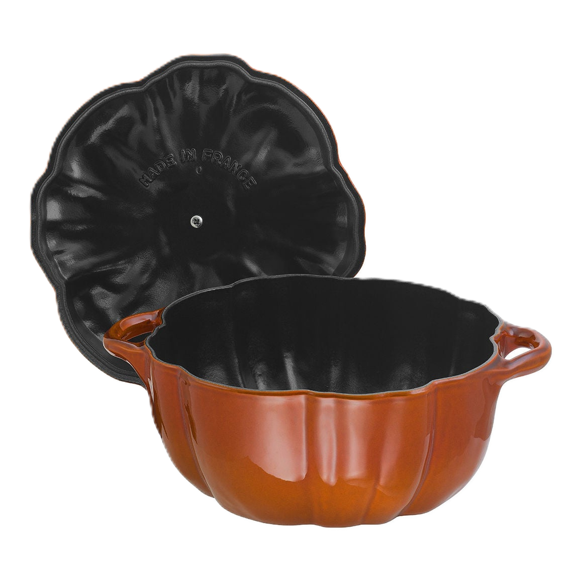 Pumpkin-shaped cast iron cookware with a lid on a white background