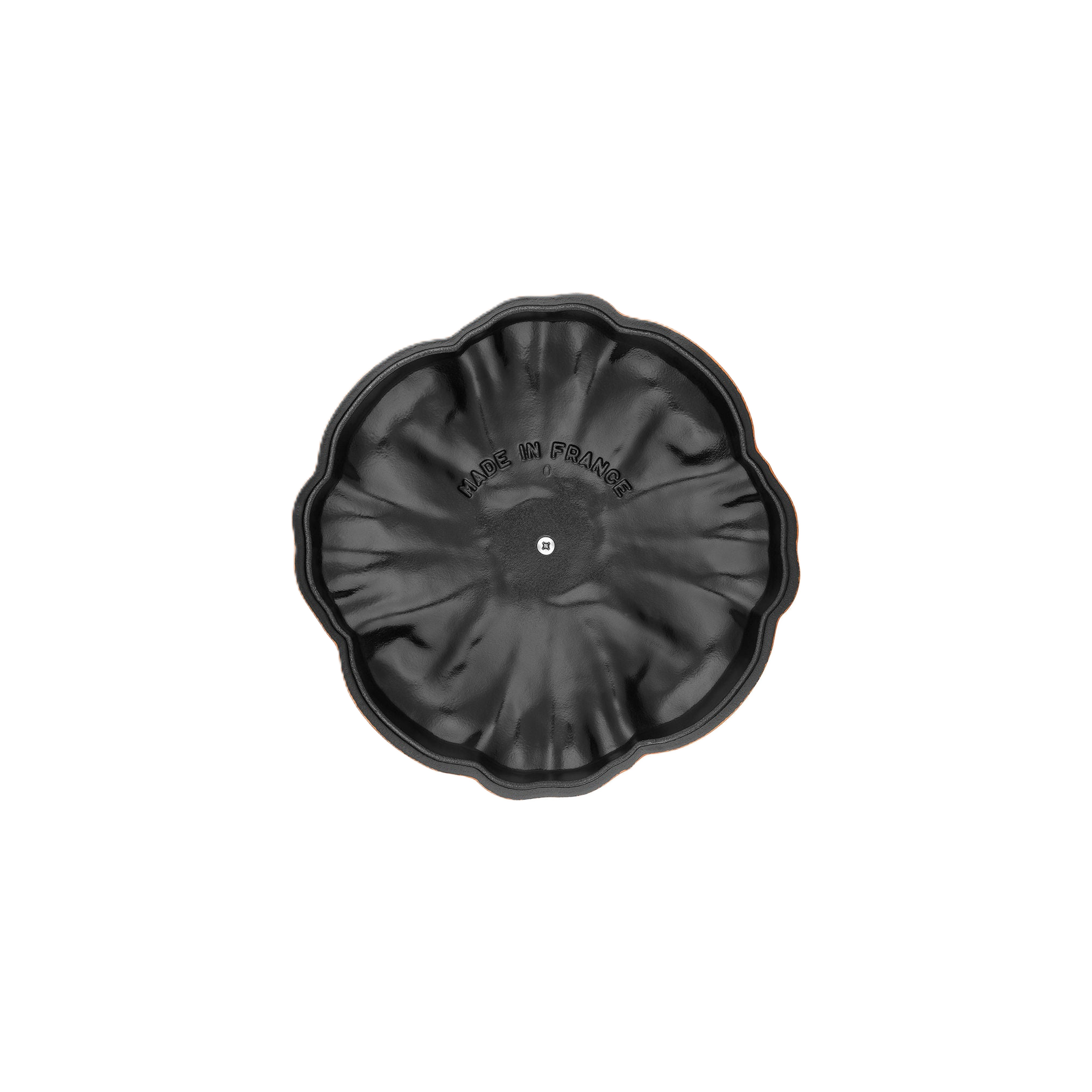 Pumpkin-shaped cast iron cookware lid bottom side on a white background