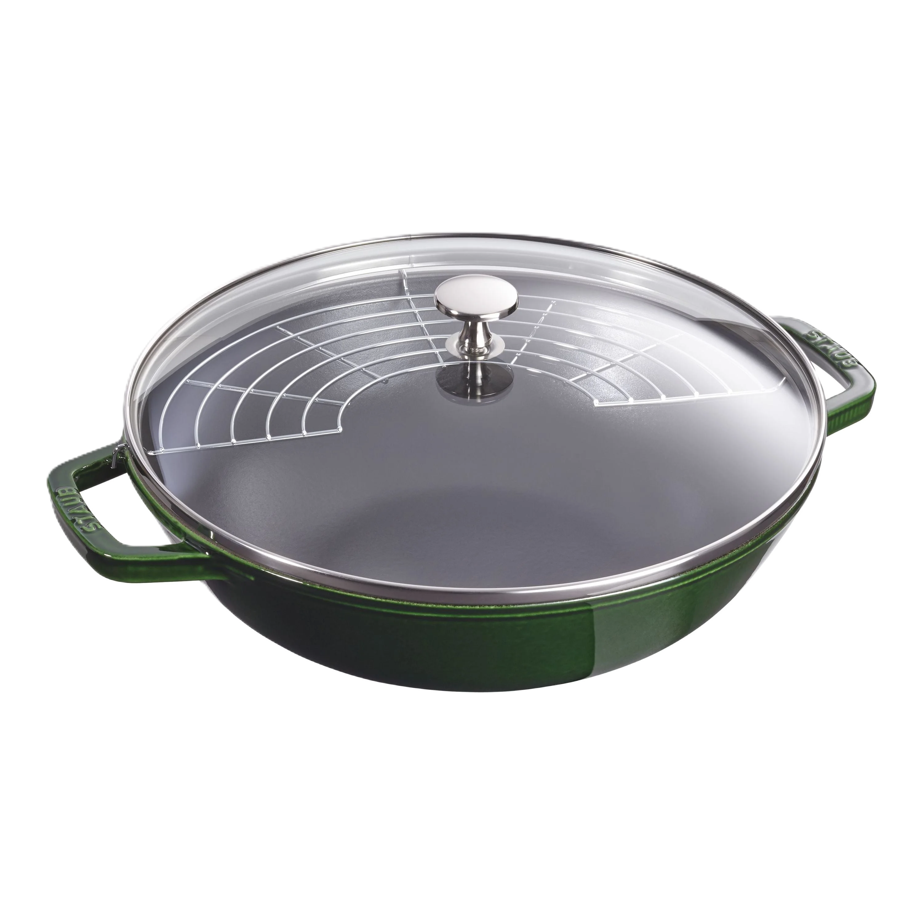 Green cast iron cookware with glass lid on a white background