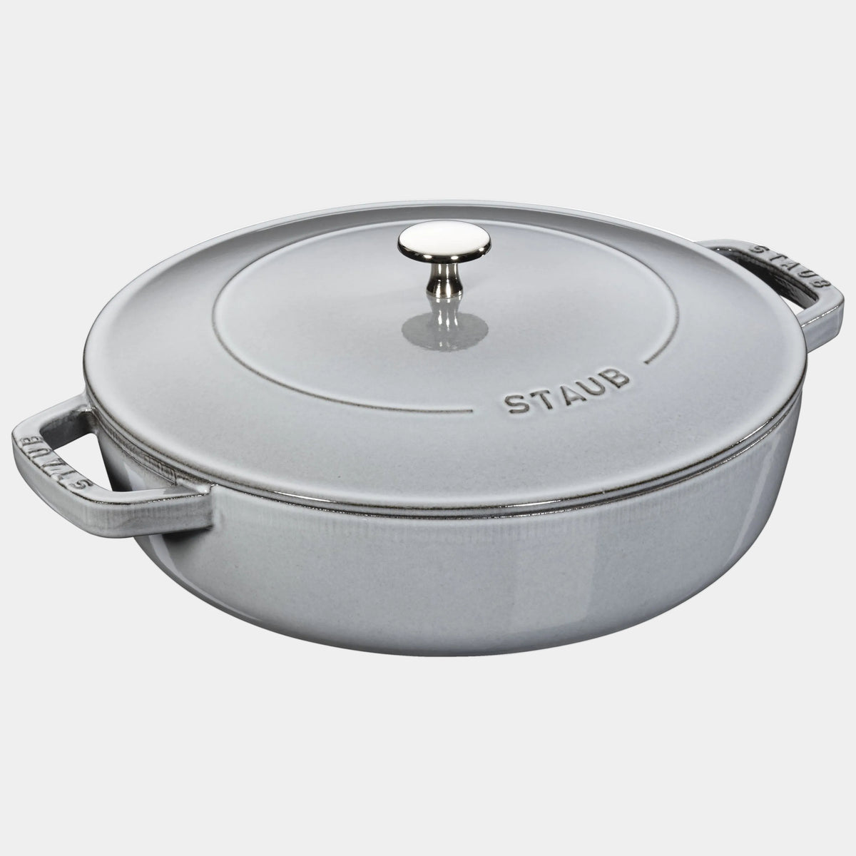 Staub cookware with a lid on a white background