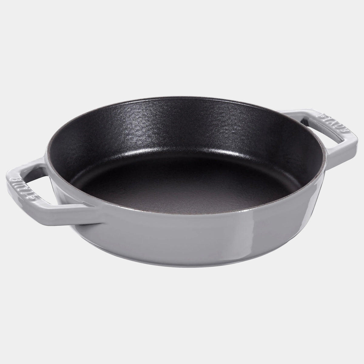 Gray cast iron skillet on a white background