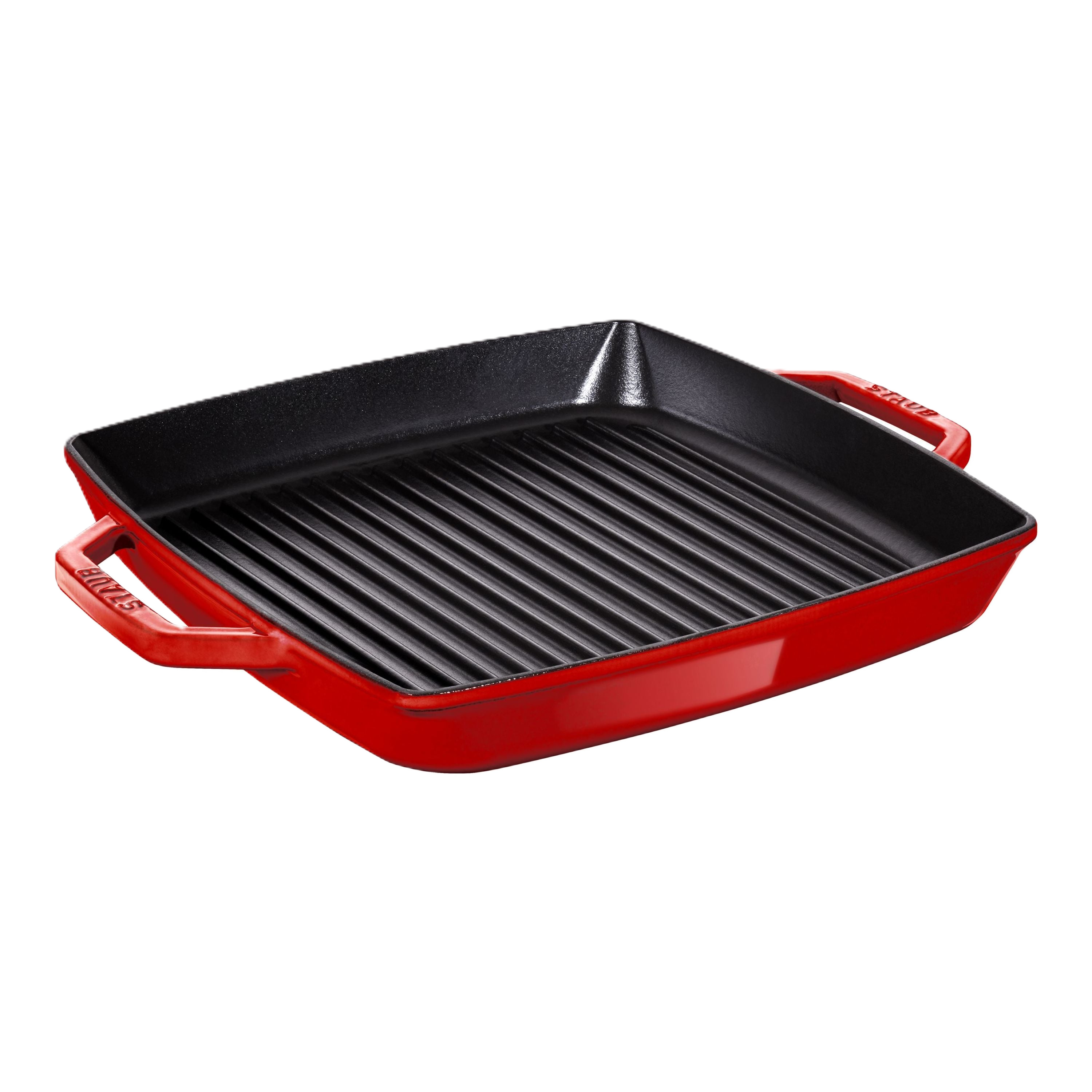 Red cast iron grill pan on a white background