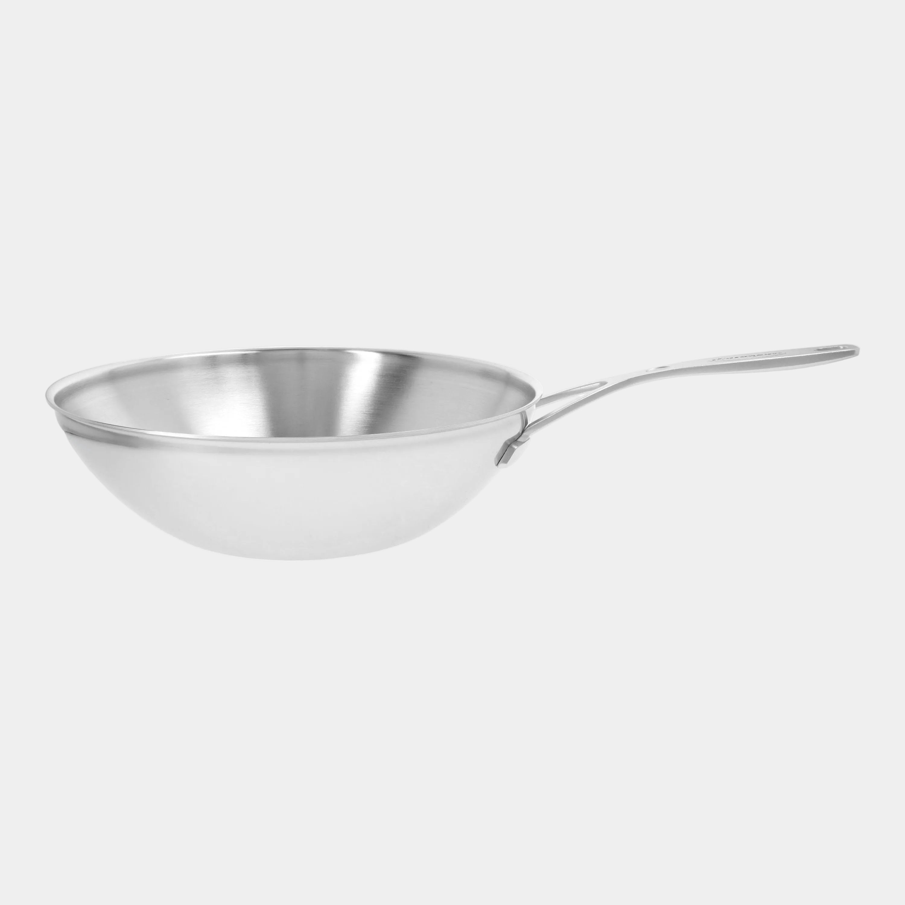 Stainless steel frying pan on a white background