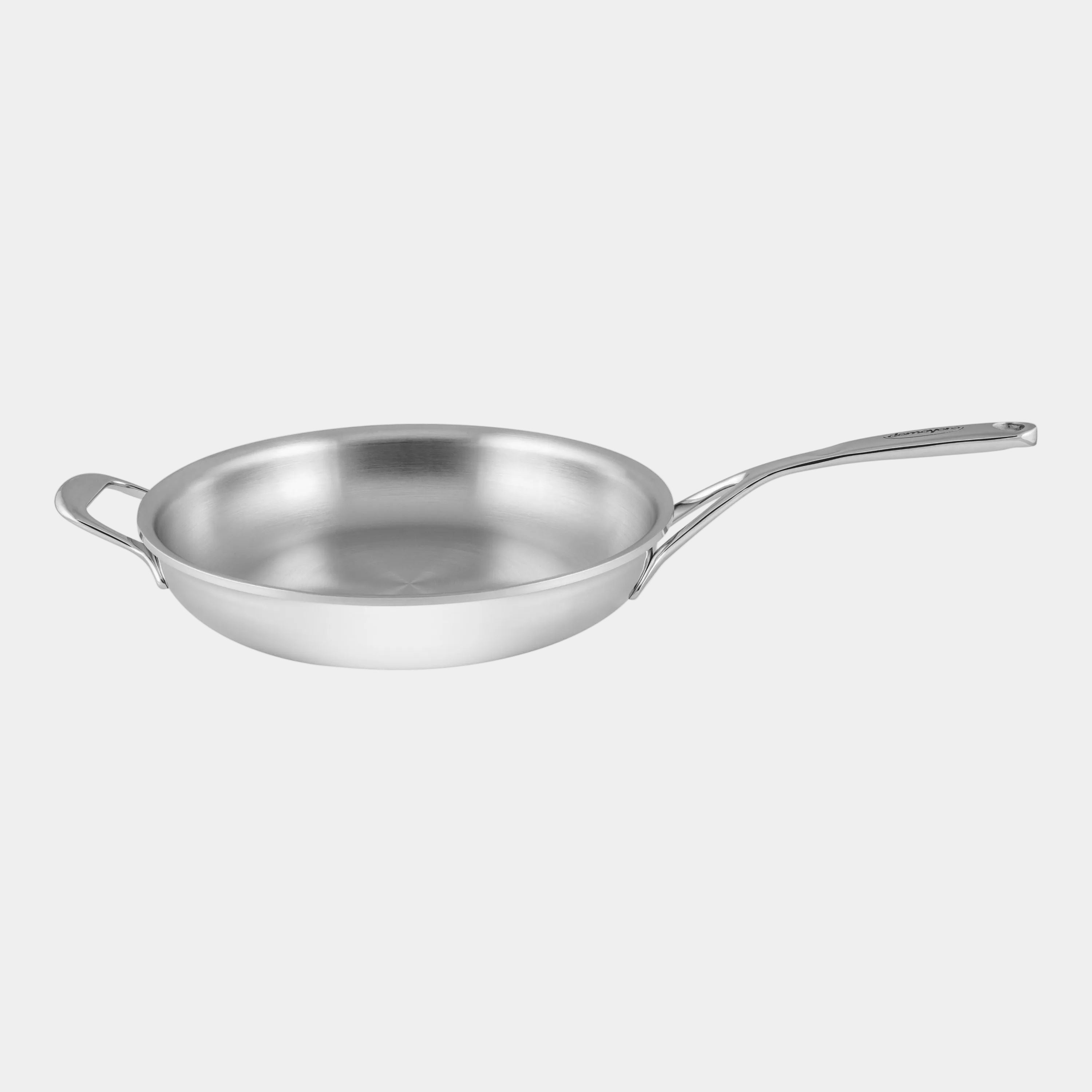 Stainless steel frying pan on a white background