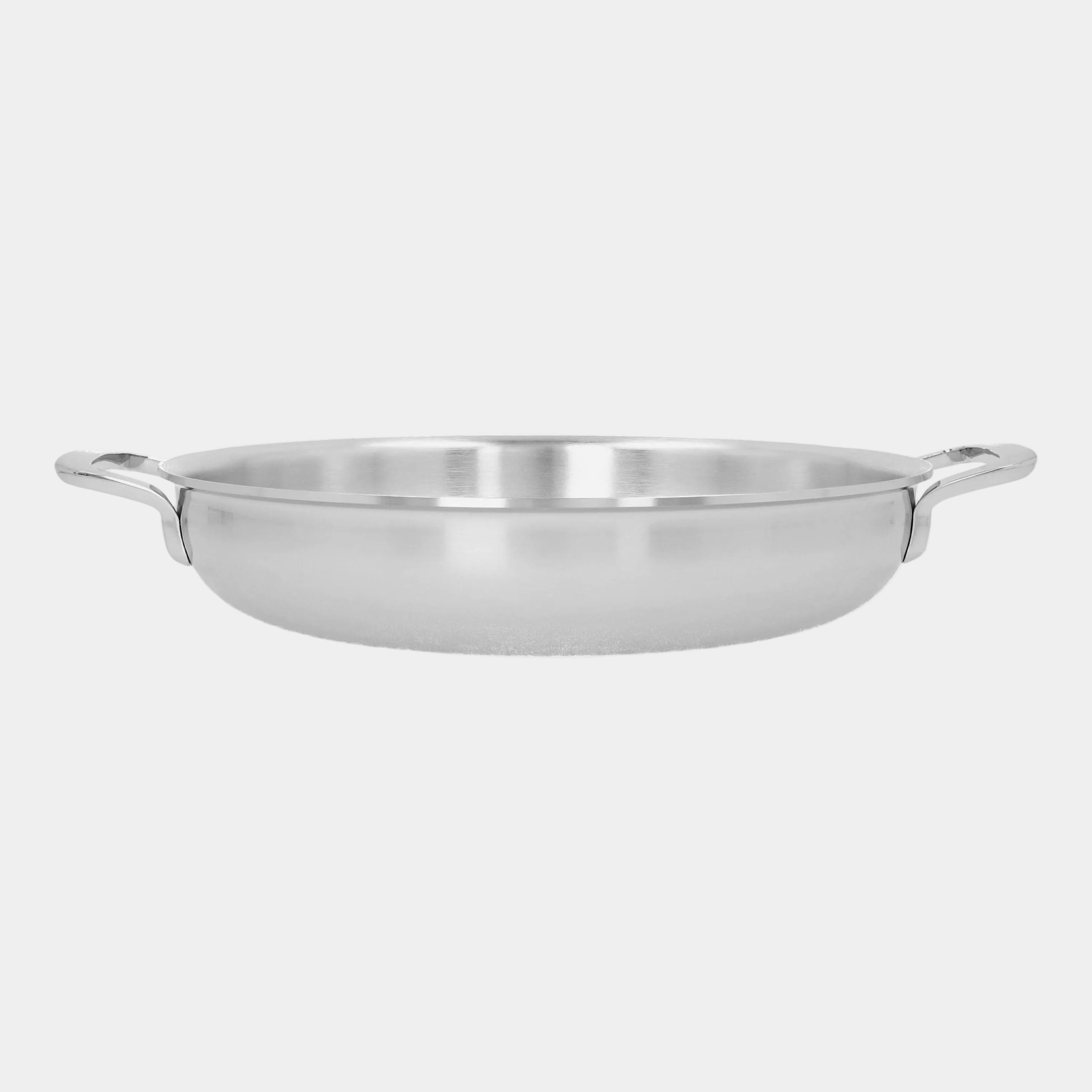 Stainless steel pan on a white background