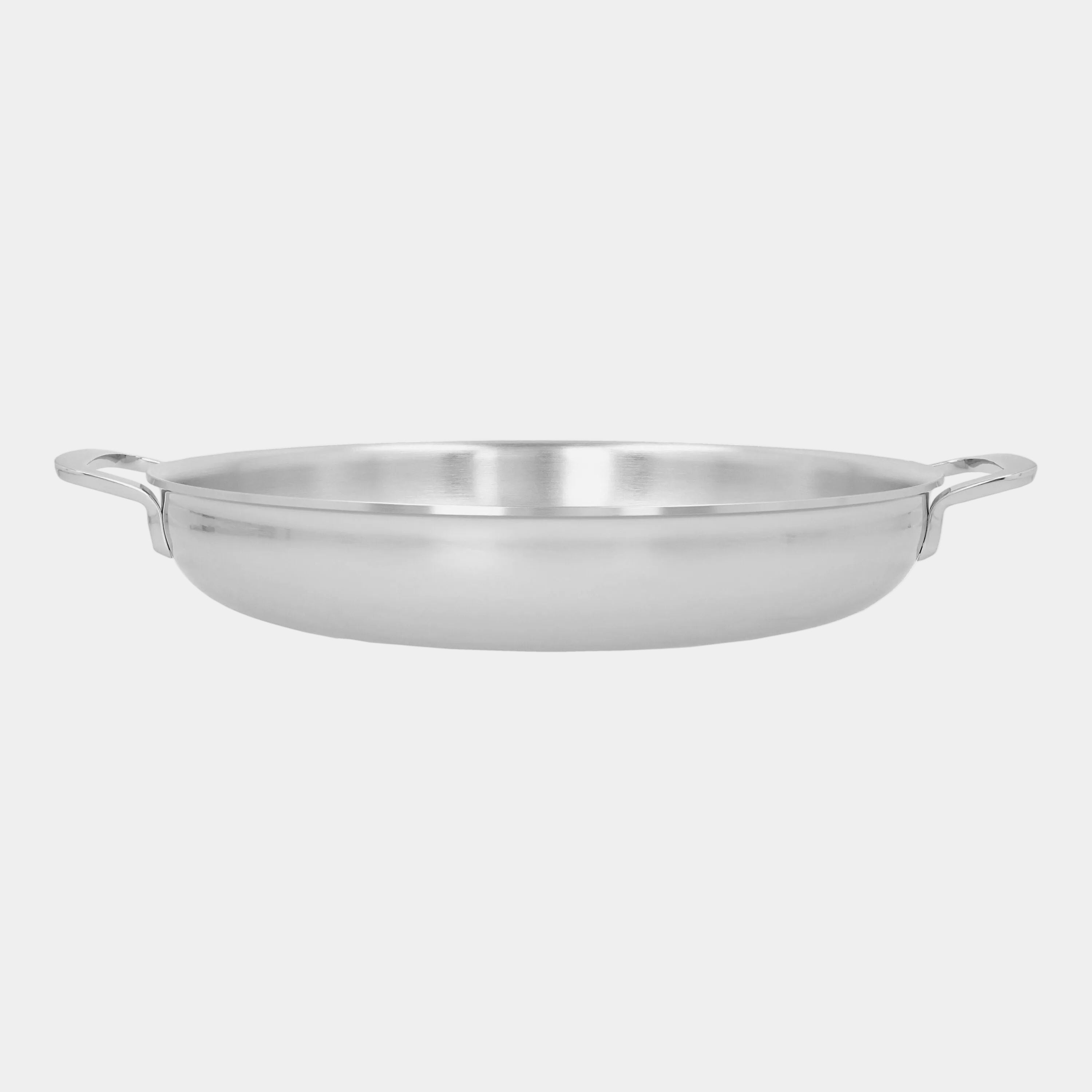 Stainless steel pan on a white background