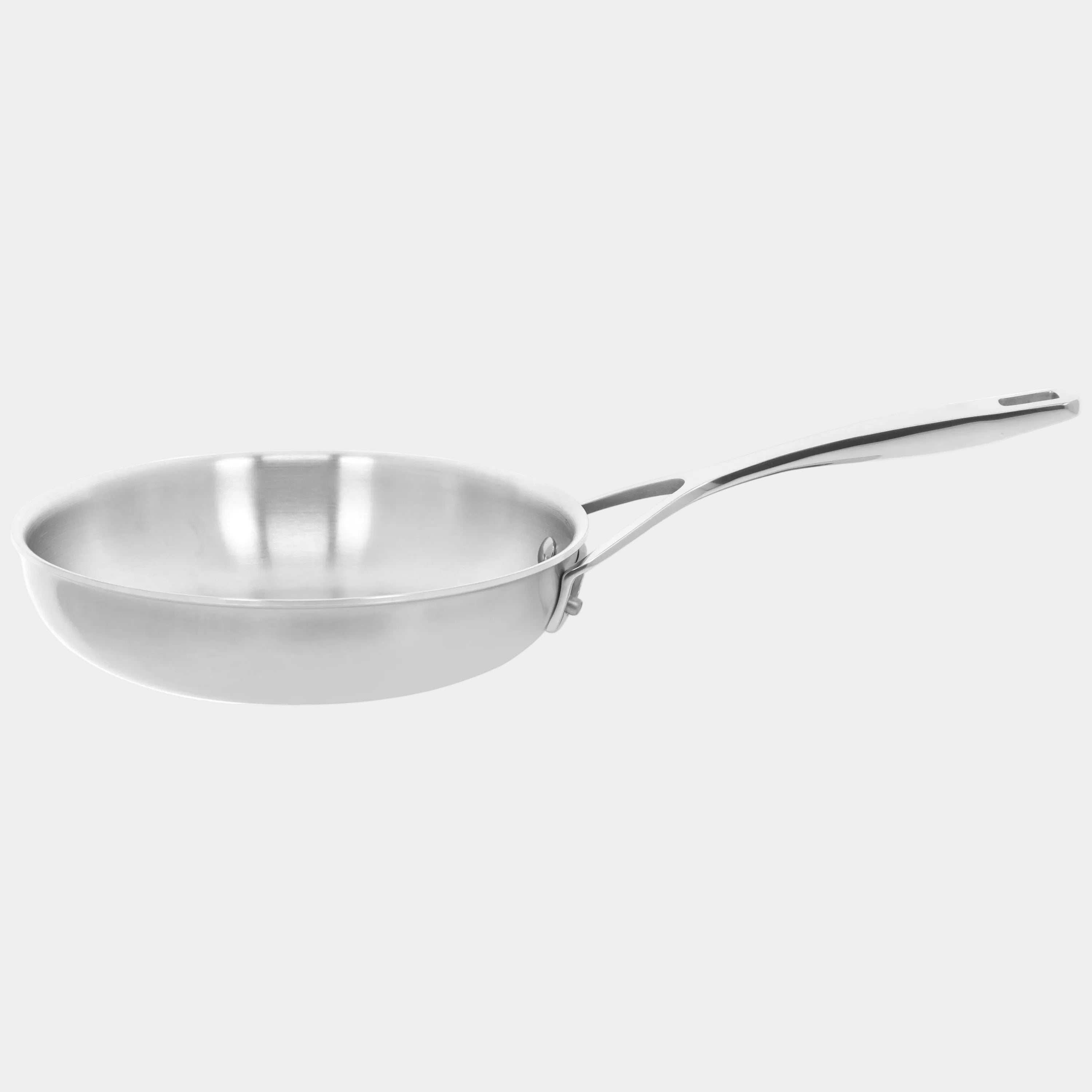 Stainless steel frying pan on a white background