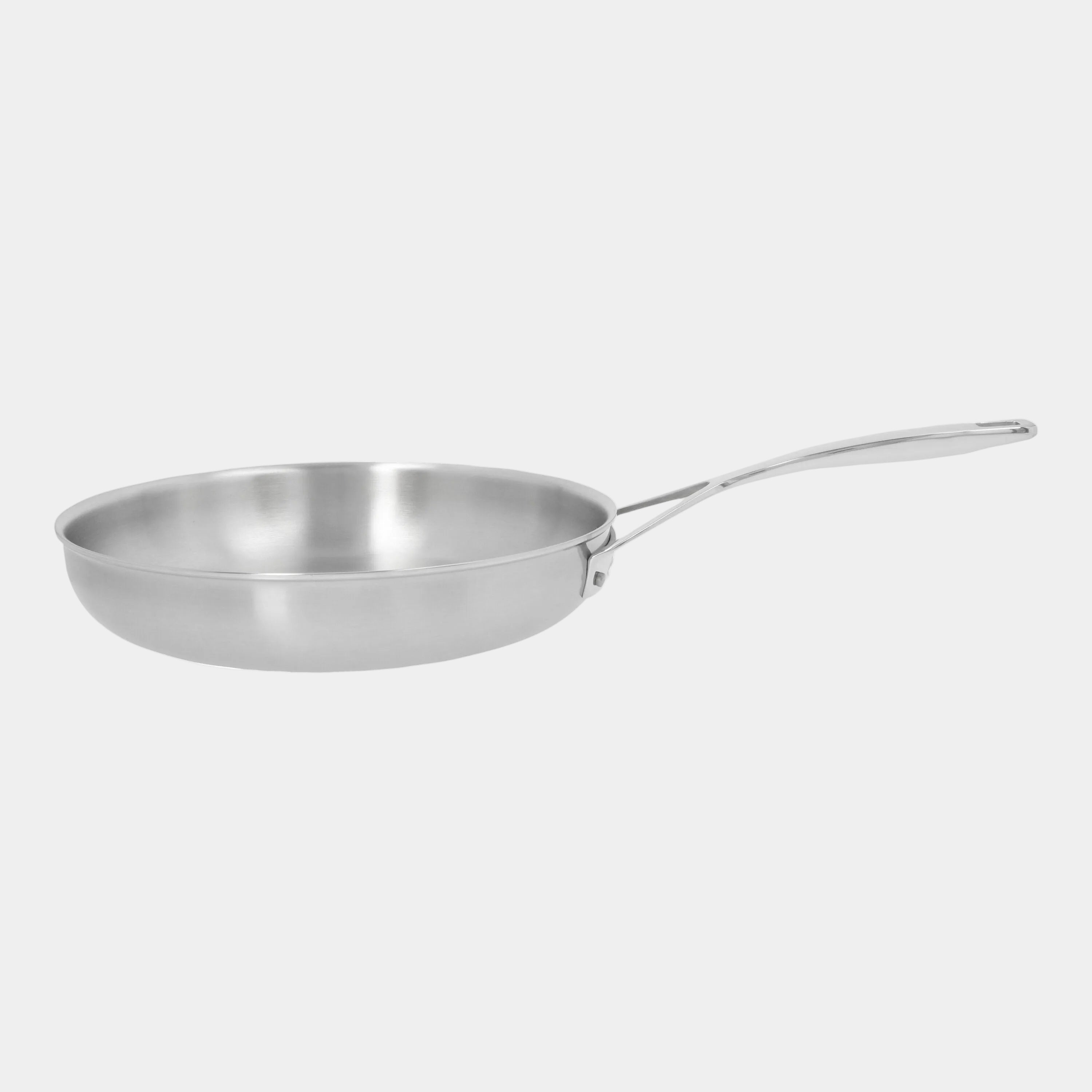 Stainless steel frying pan on a white background