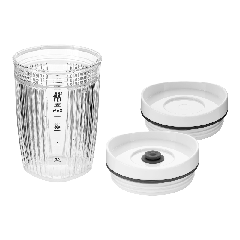 Set of white bowls with a clear measuring container on a white background