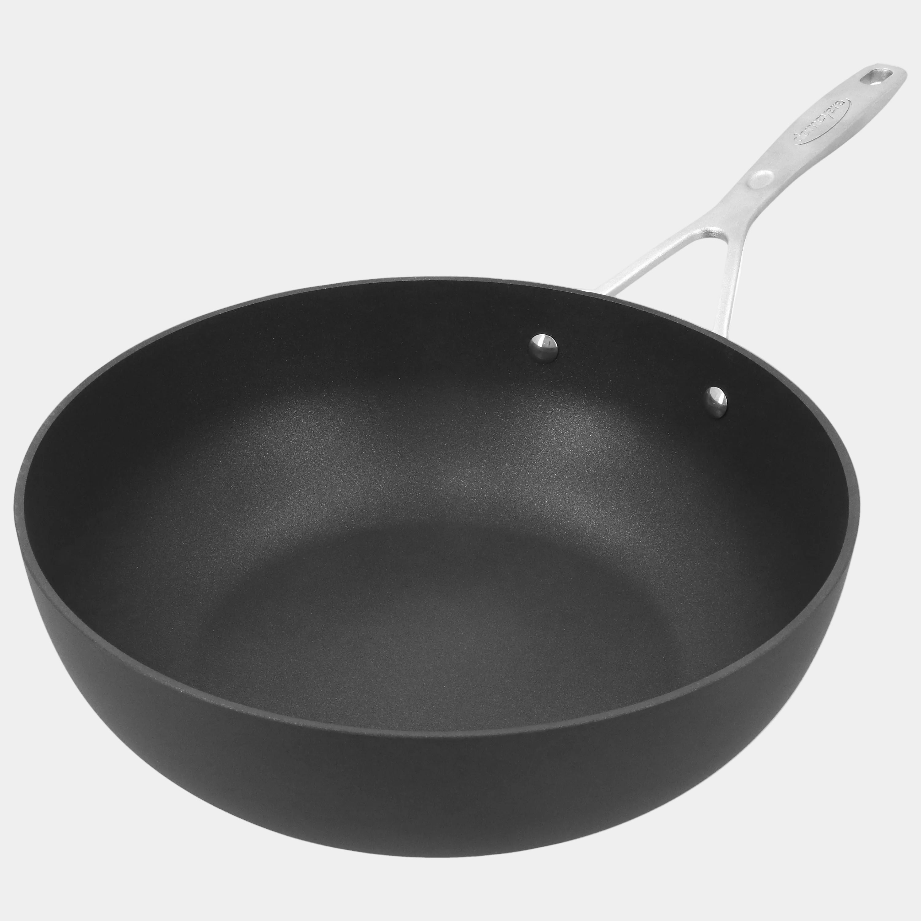Black frying pan with a white handle on a white background