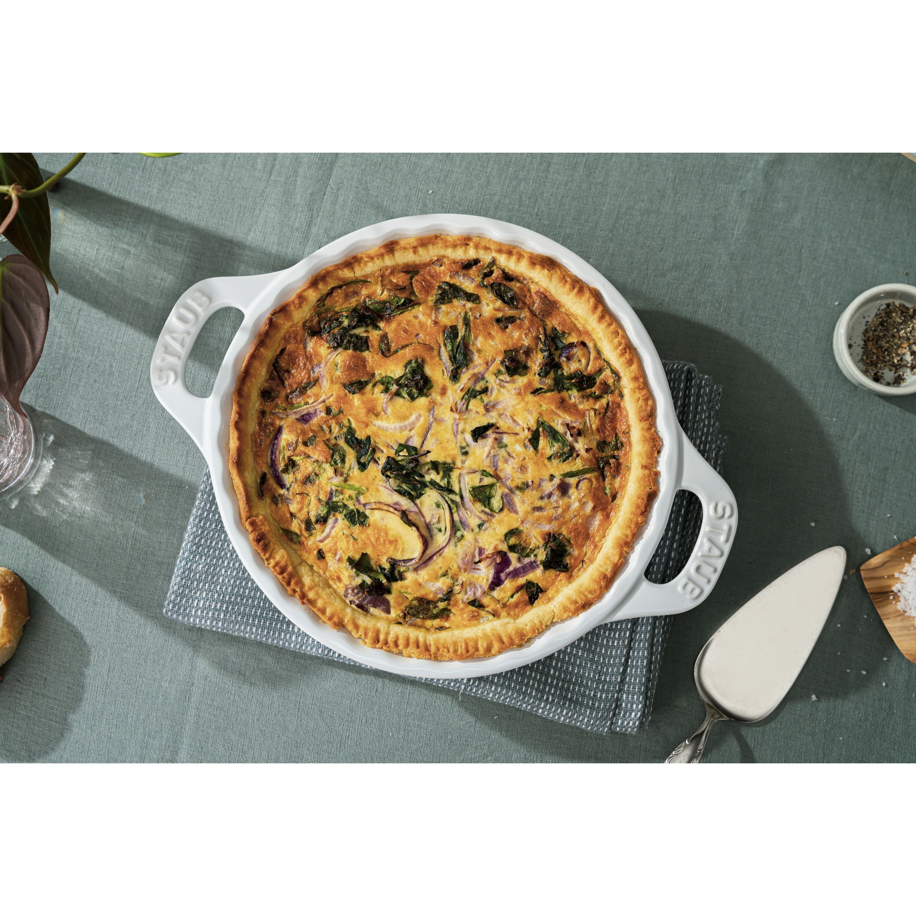 Quiche in STAUB Ceramique Mixed Baking Dish Set White, showcasing its heat retention and perfect baking results.