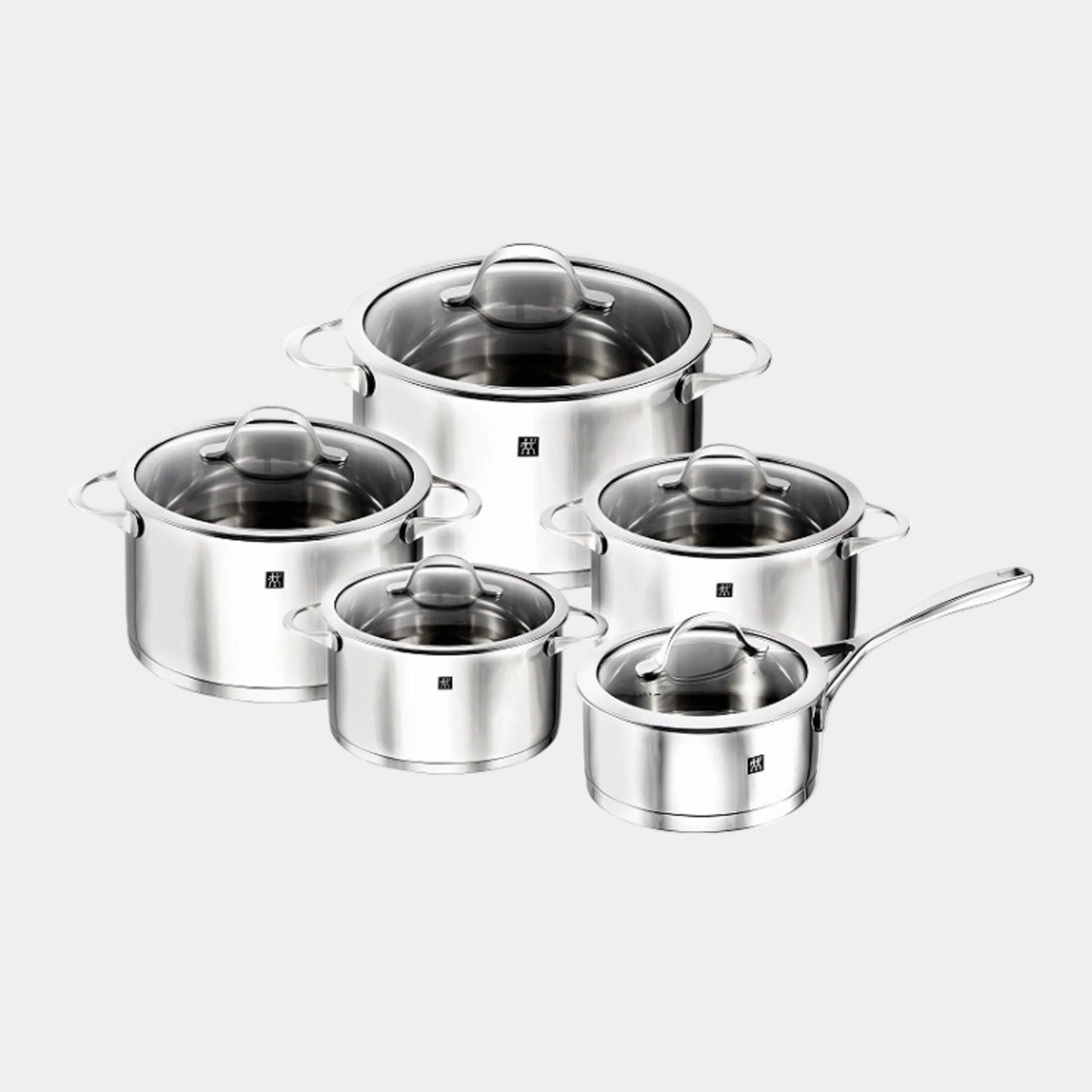 Set of stainless steel cookware on a white background